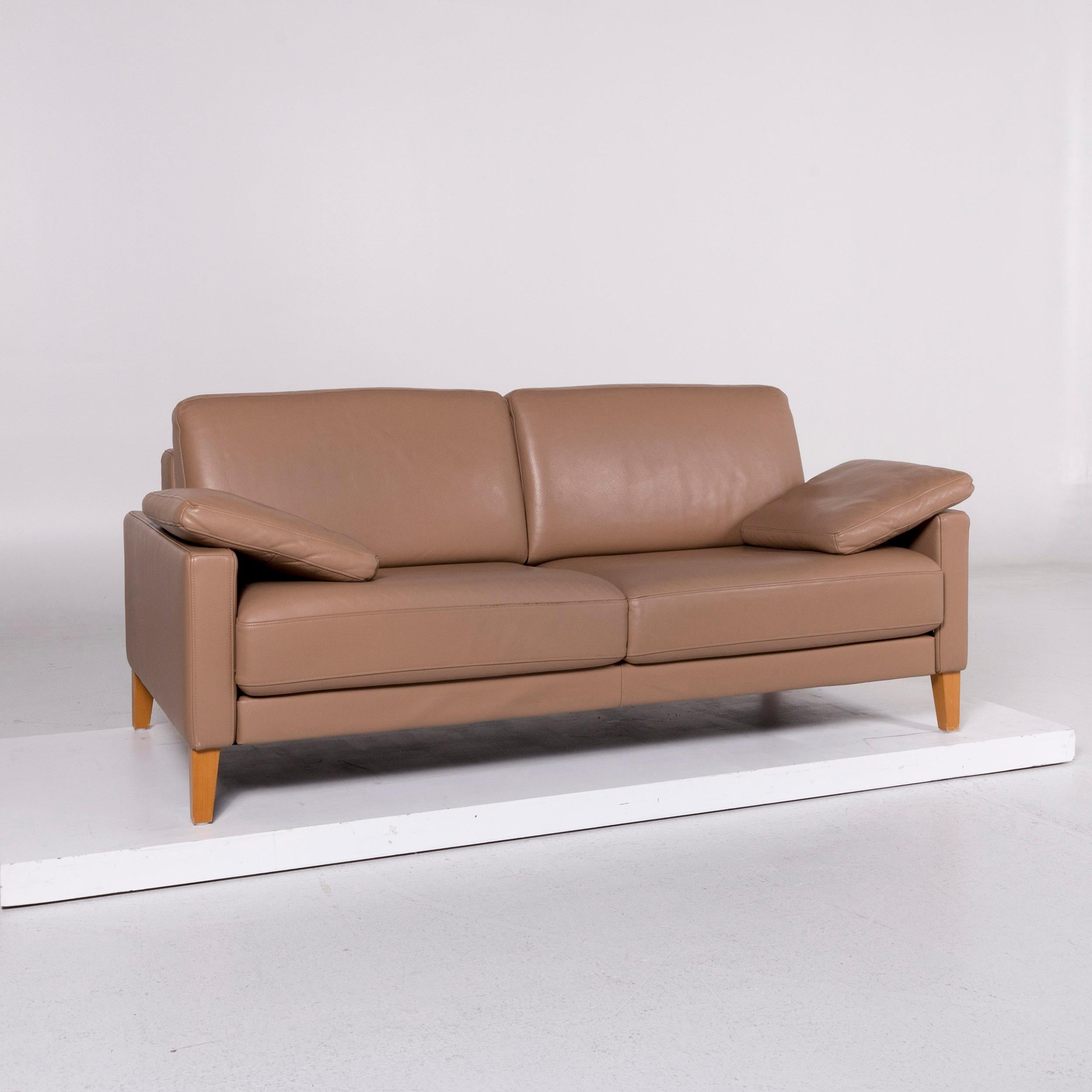 We bring to you a Rolf Benz leather sofa brown two-seat couch.

 Product measurements in centimeters:
 
Depth 97
Width 186
Height 84
Seat-height 45
Rest-height 64
Seat-depth 58
Seat-width 167
Back-height 58.
          
