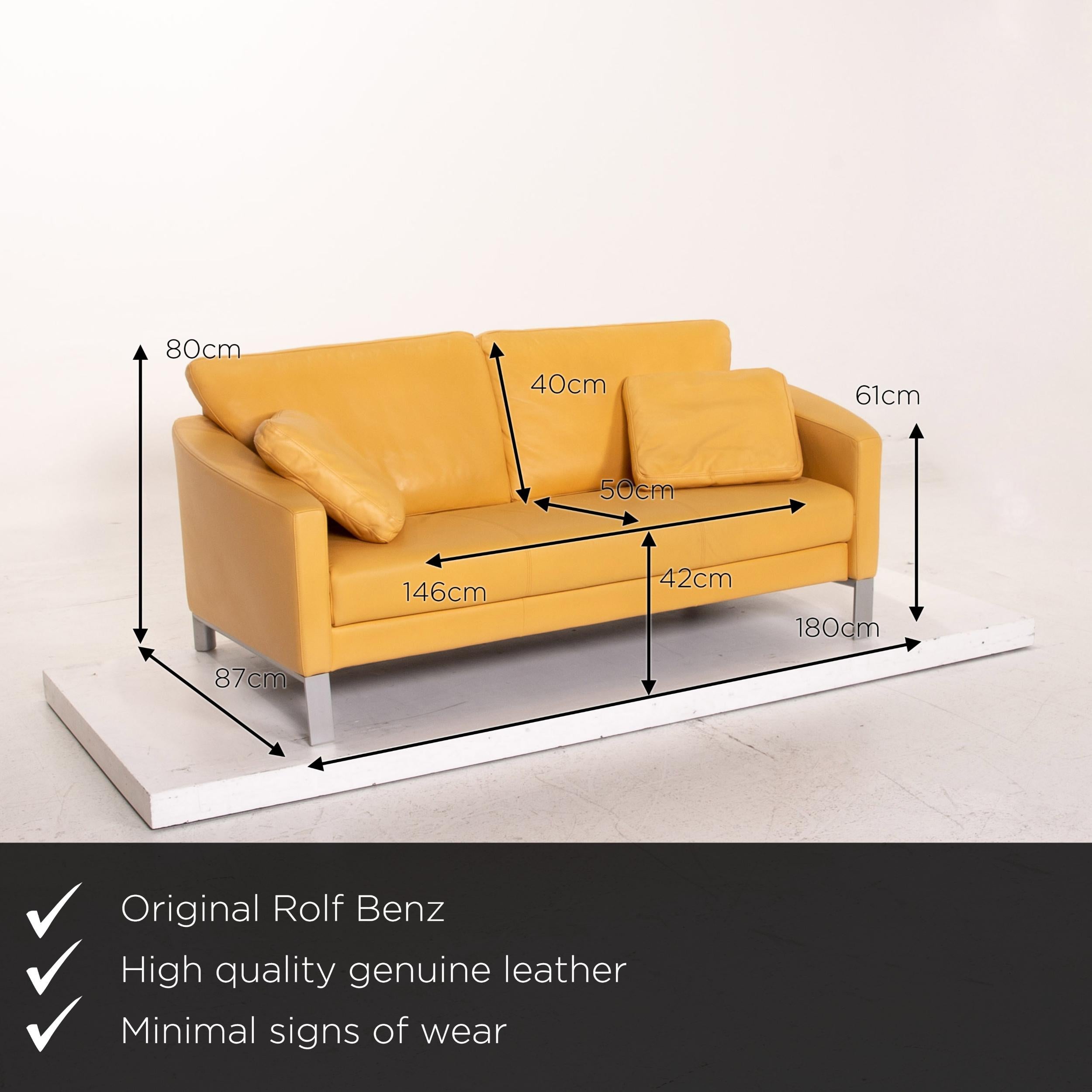 We present to you a Rolf Benz leather sofa yellow two-seat couch.
  
 

 Product measurements in centimeters:
 

Depth 87
Width 180
Height 80
Seat height 42
Rest height 61
Seat depth 50
Seat width 146
Back height 40.