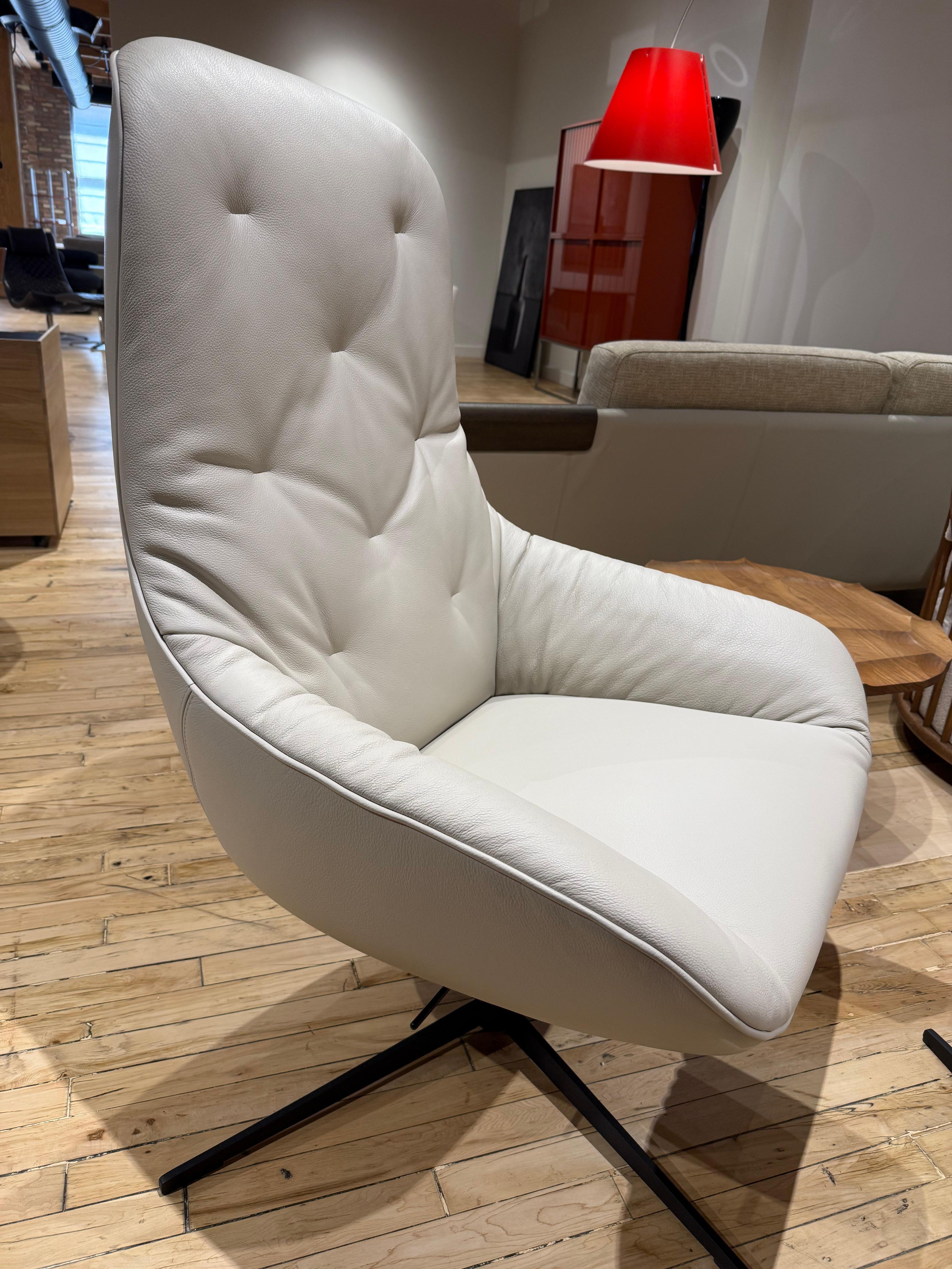 European Rolf Benz 'Meg' Swiveling Armchair with Tilt and Footstool in Off White Leather For Sale
