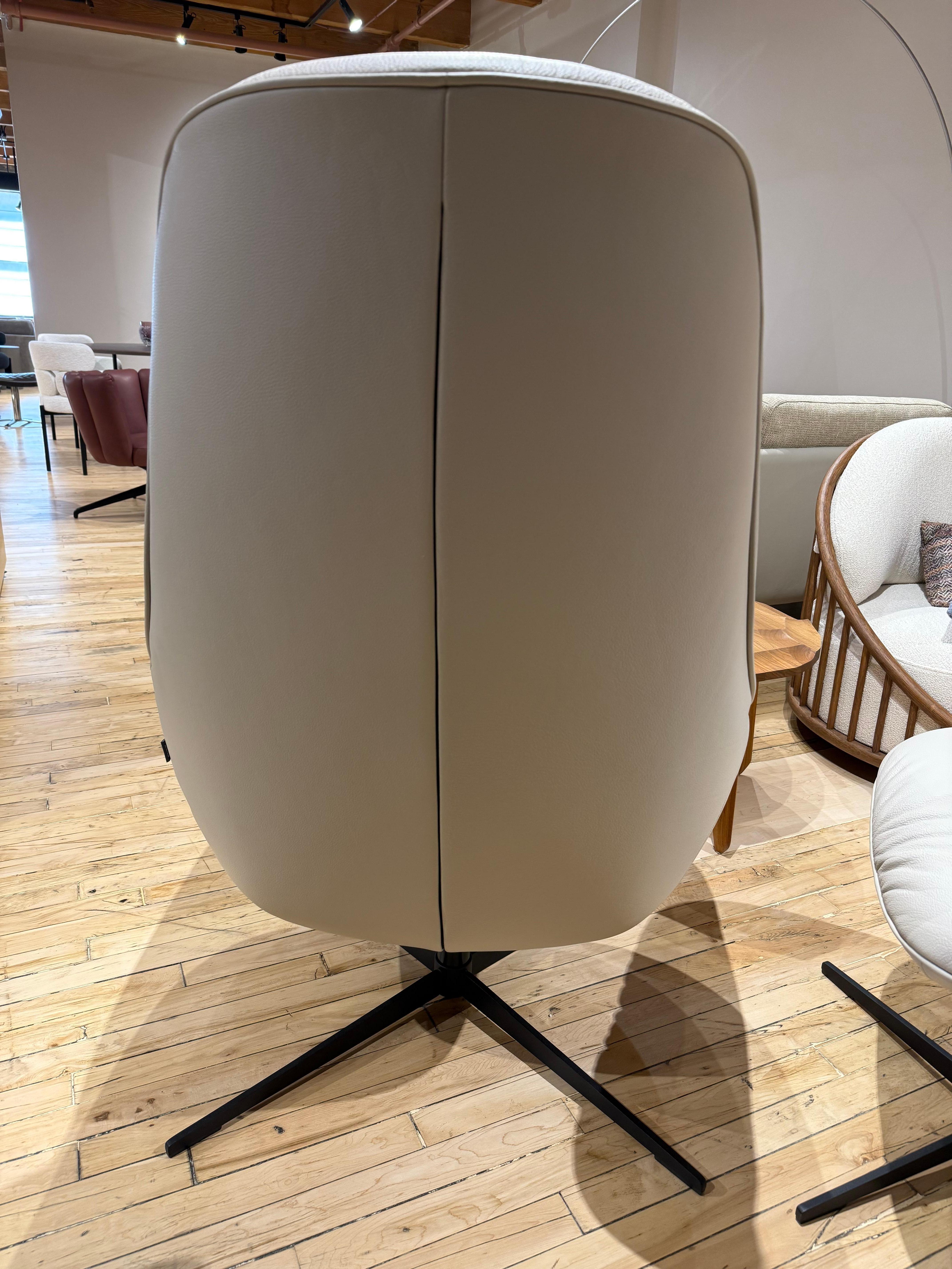 Rolf Benz 'Meg' Swiveling Armchair with Tilt and Footstool in Off White Leather In Good Condition For Sale In Chicago, IL