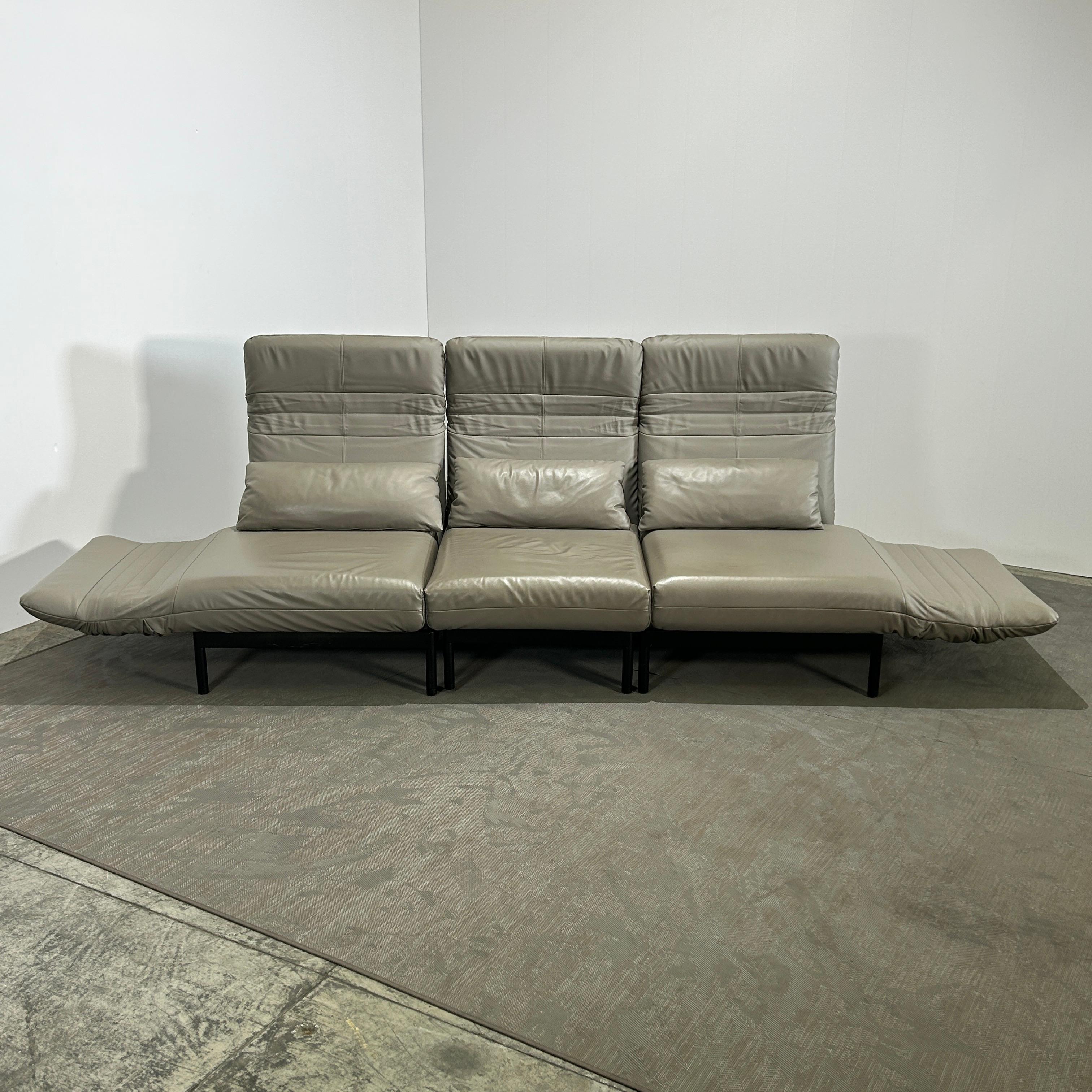 Introducing the Plura Sofa with Chaise by Rolf Benz - a true embodiment of modern luxury. Expertly crafted with premium materials, this sofa features a sleek, contemporary silhouette designed for both comfort and style. The plush chaise invites