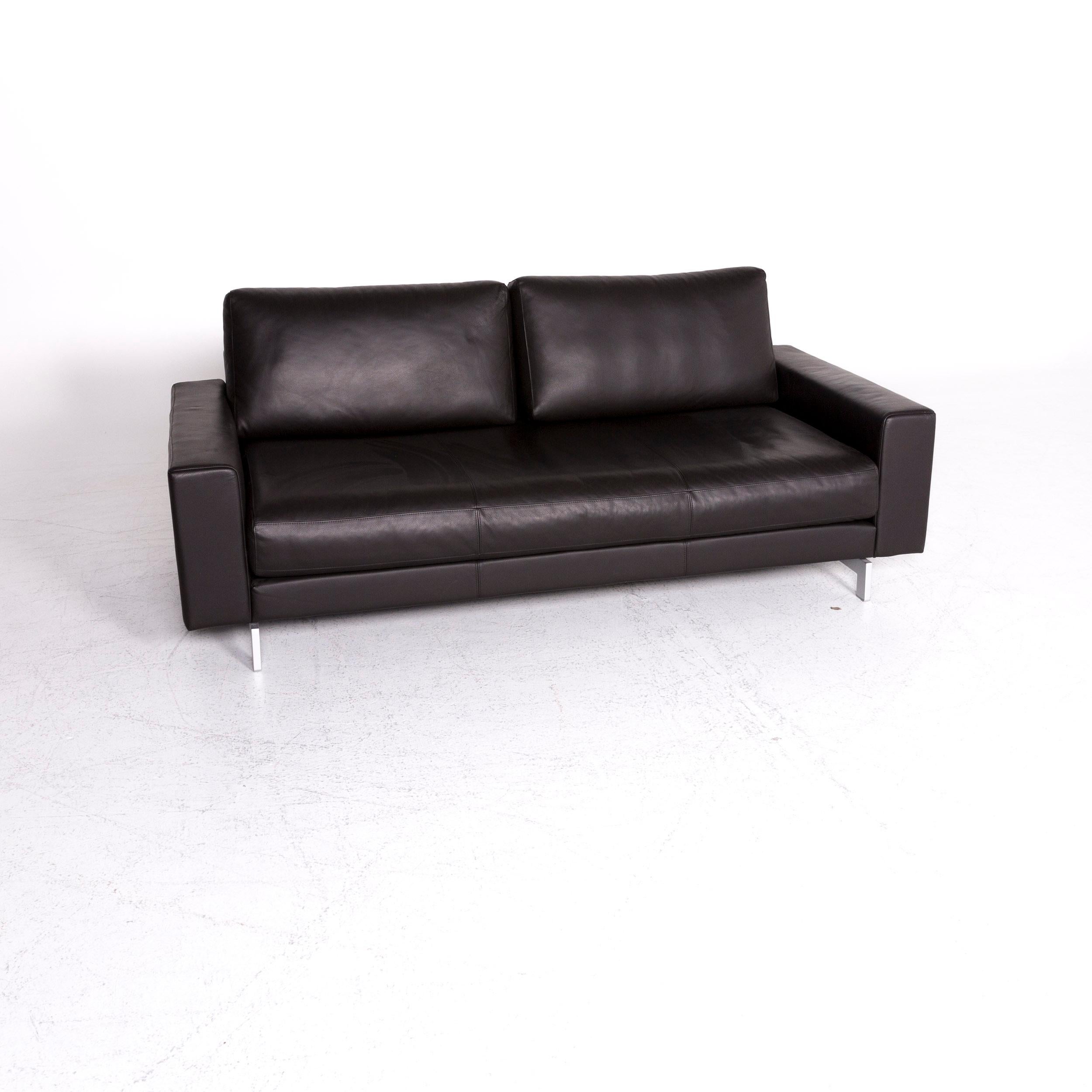 We bring to you a Rolf Benz Vida designer leather sofa brown two-seat couch. 

Product measurements in centimeters:

Depth 97
Width 200
Height 82
Seat-height 44
Rest-height 54
Seat-depth 61
Seat-width 167
Back-height 40.
     