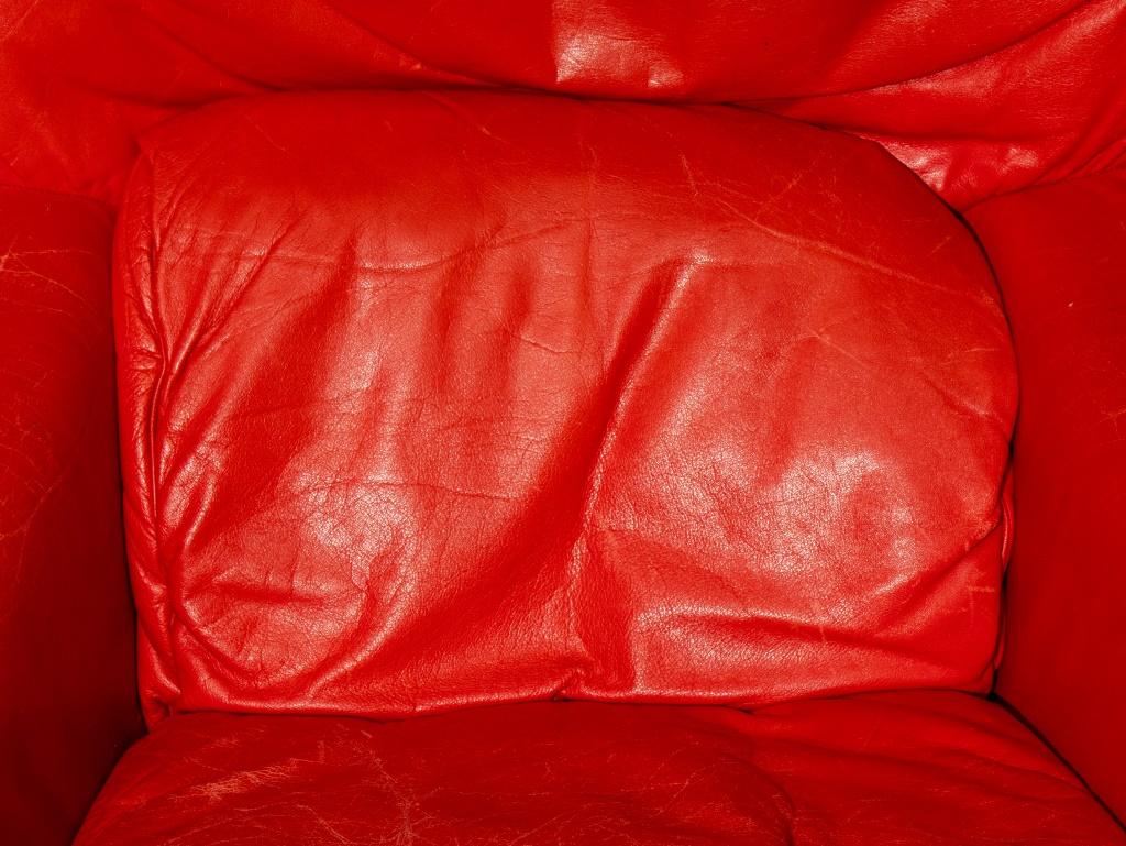 Rolf Benz (German, b. 1933) for Cy Mann Red Leather Swivel Armchair and Ottoman, 
