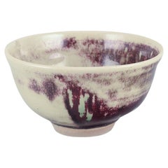 Rolf Fagerberg. Ciotola in ceramica. Smalto nei toni del viola e del sabbia.
