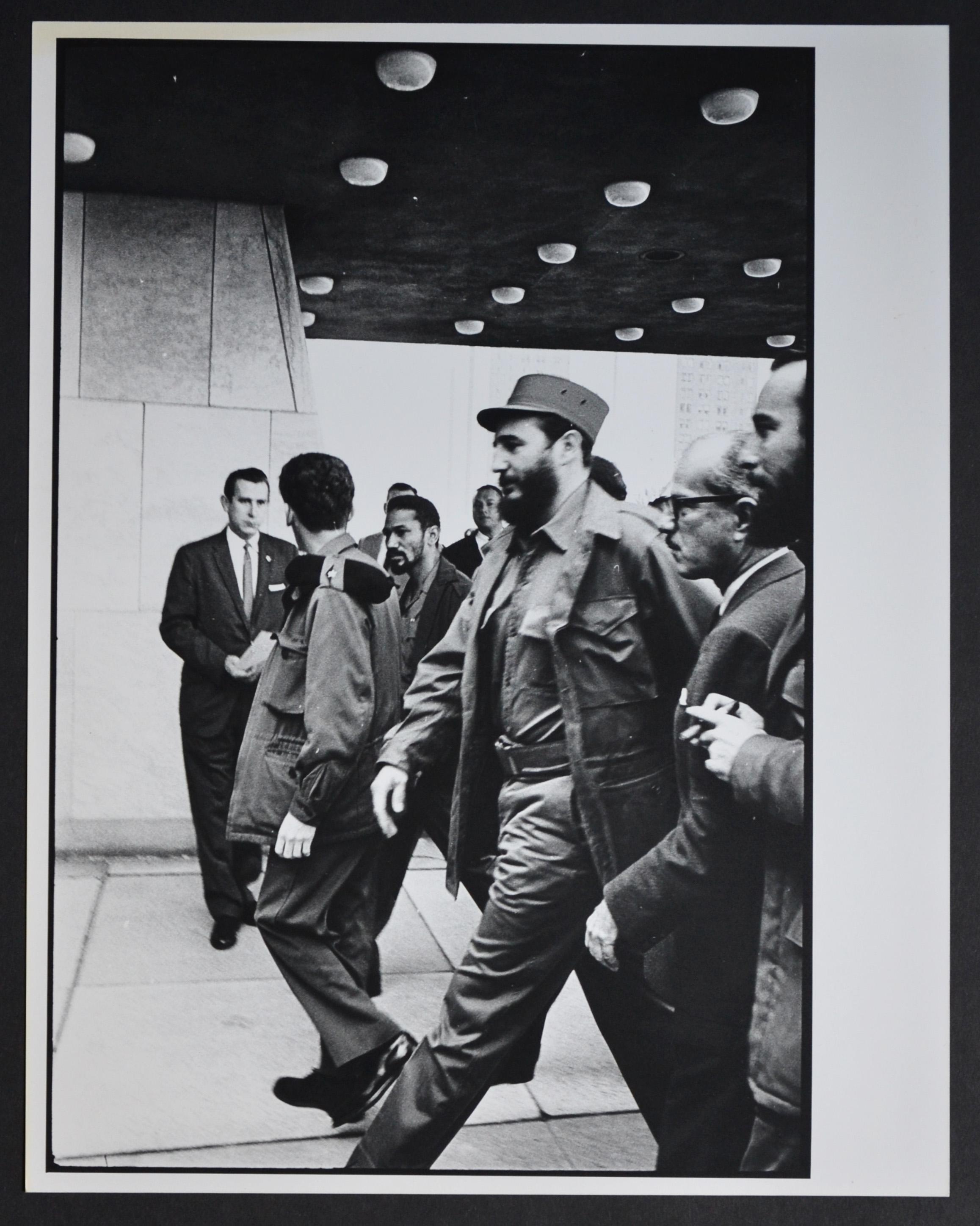 Rolf Gillhausen Black and White Photograph - Fidel Castro entering buidling, Cuba 1950s.