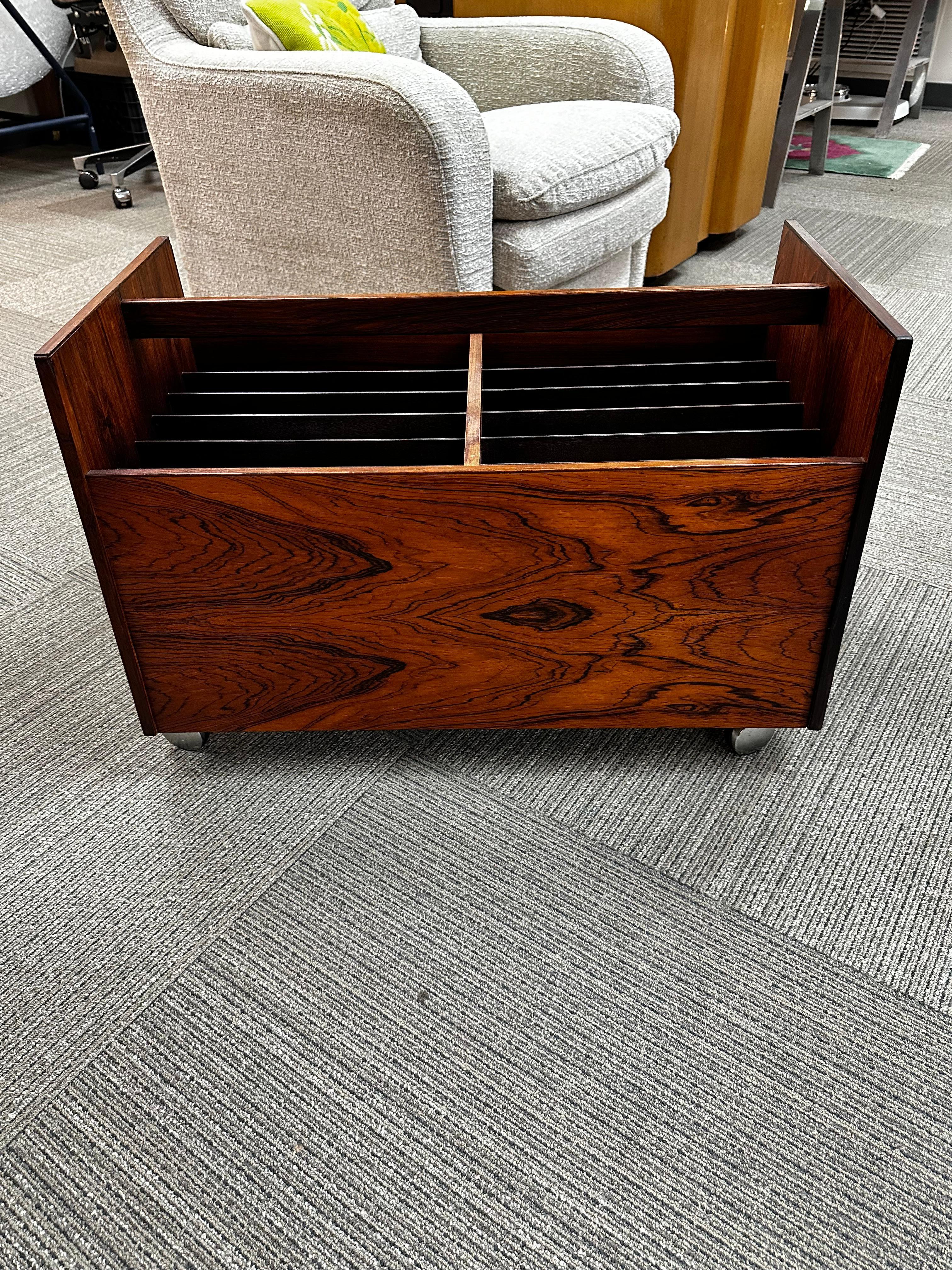 Rolf Hesland for Bruksbo Rosewood Magazine or Record Rack

This beautifully designed mid-century modern rosewood magazine rack by Rolf Hesland for Bruksbo boasts both functionality and elegance. Old-growth rosewood lends a high contrast, while the