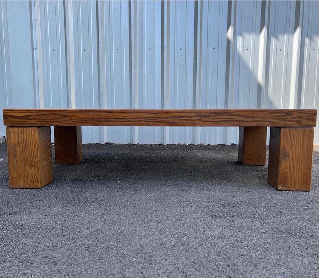 Rolf Middelboe & Gorm Lindum for Tranekær Furniture parquetry Danish modern oak coffee table with thick block legs made in the 1970s, Denmark. This mid-century modern brutalist style coffee table is in great vintage condition. 
Measures: 54.50”