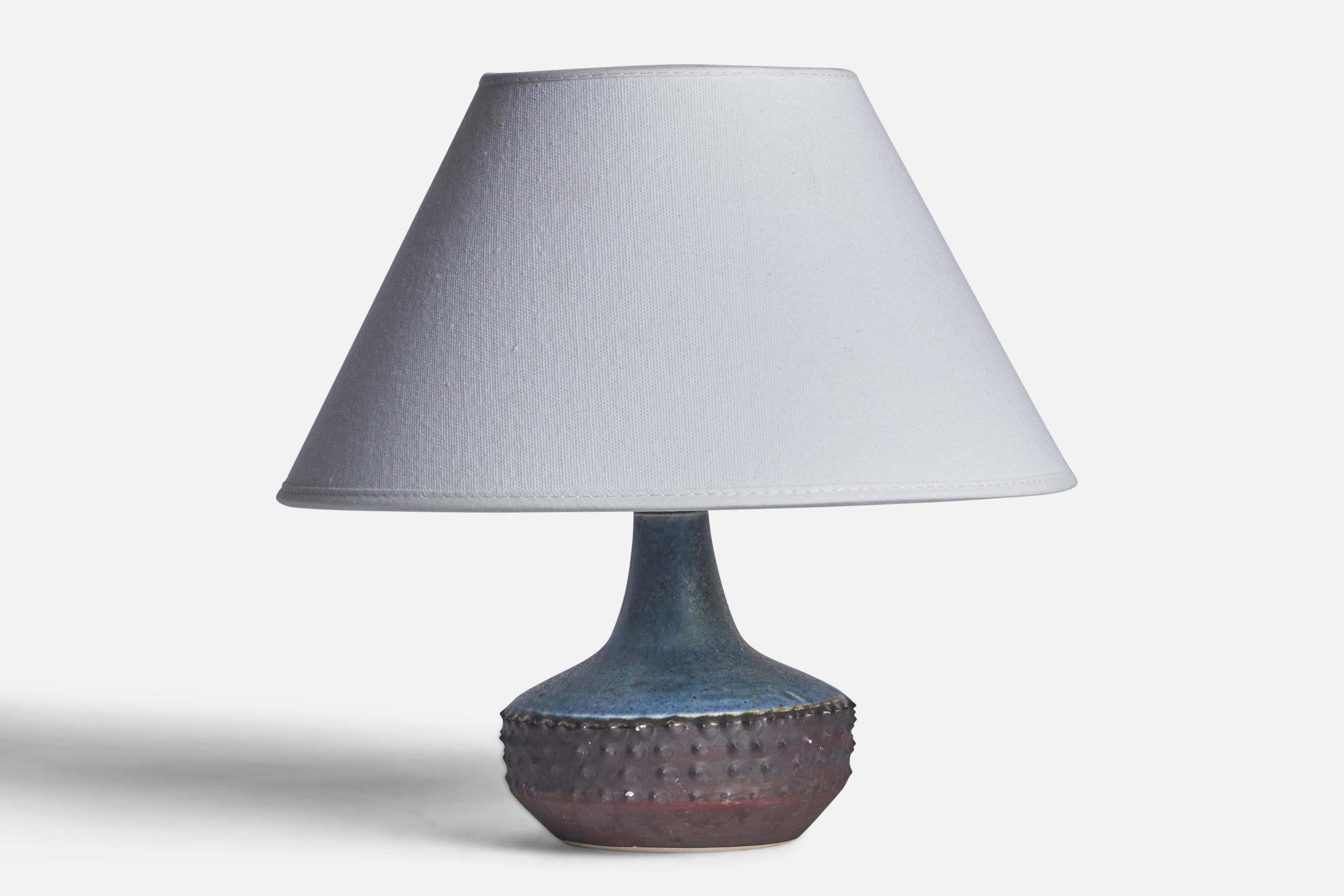 A small grey and blue-glazed stoneware table lamp designed and produced in Sweden, 1960s.

Dimensions of Lamp (inches): 6.65” H x 4.45” Diameter
Dimensions of Shade (inches): 7” Top Diameter x 10” Bottom Diameter x 5.5” H 
Dimensions of Lamp with