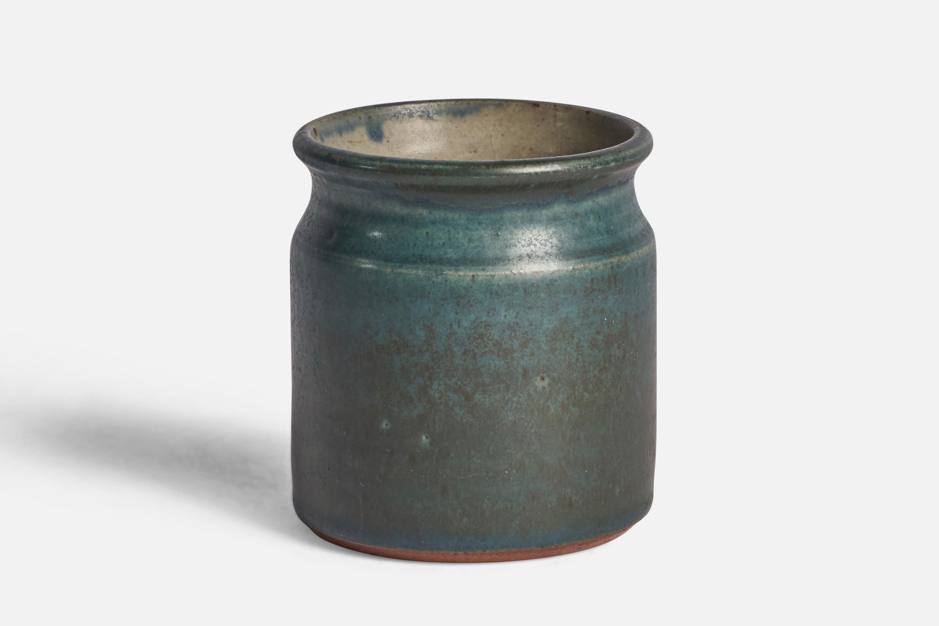 A blue-glazed stoneware vase designed and produced by Rolf Palm, Mölle, Sweden, 1962.

“HOSTSALONG - 62” on bottom (photo attached)