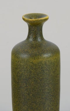 Rolf Palm, Swedish ceramicist. Unique miniature vase with  yellow-green glaze.