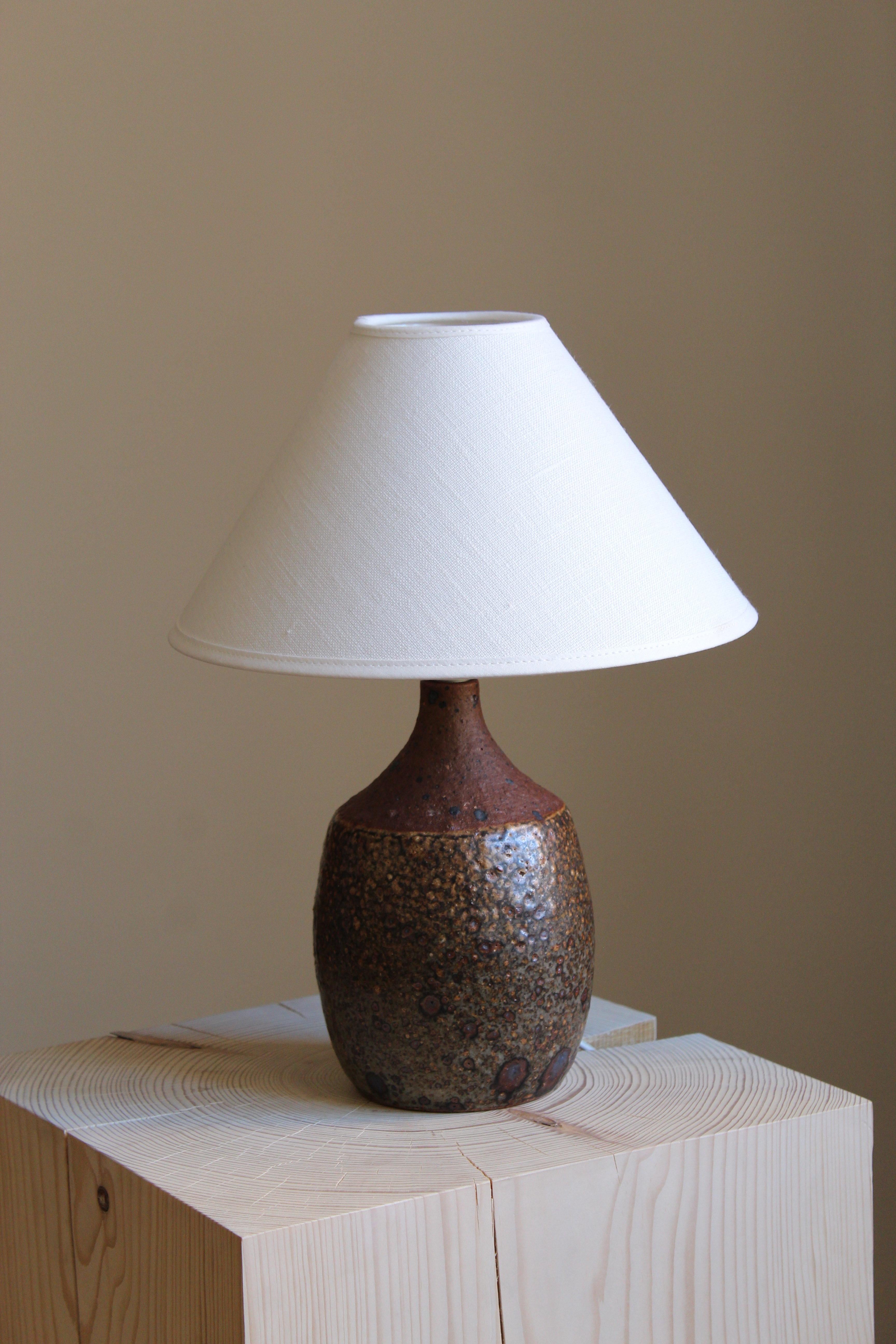 A table lamp. Produced and designed by Rolf Palm, Sweden.

In glazed stoneware. Sold without lampshade.