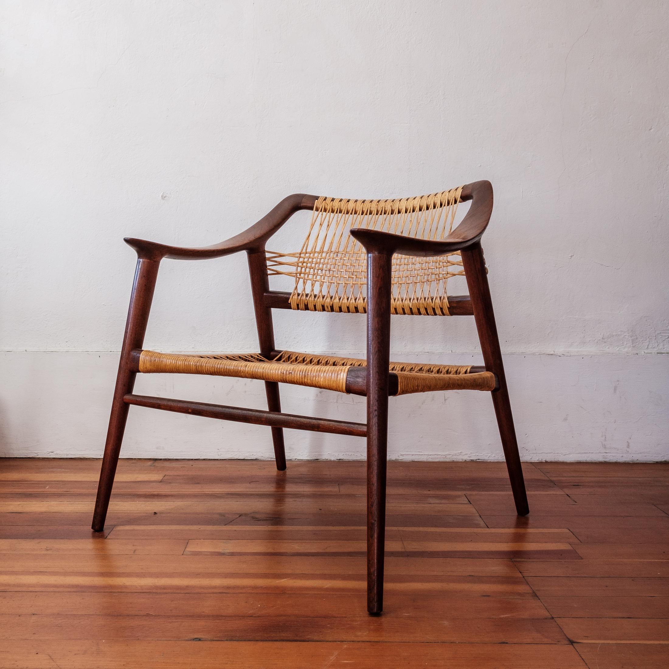 Rolf Rastad & Adolf Relling “Bambi” teak and cane chair. This is the more desirable low and wide lounge version. New professional caning. Gustav Bahus & Eft Norway, 1955-56. 

Literature: Norwegian Icons: Important Norwegian Design from the Era