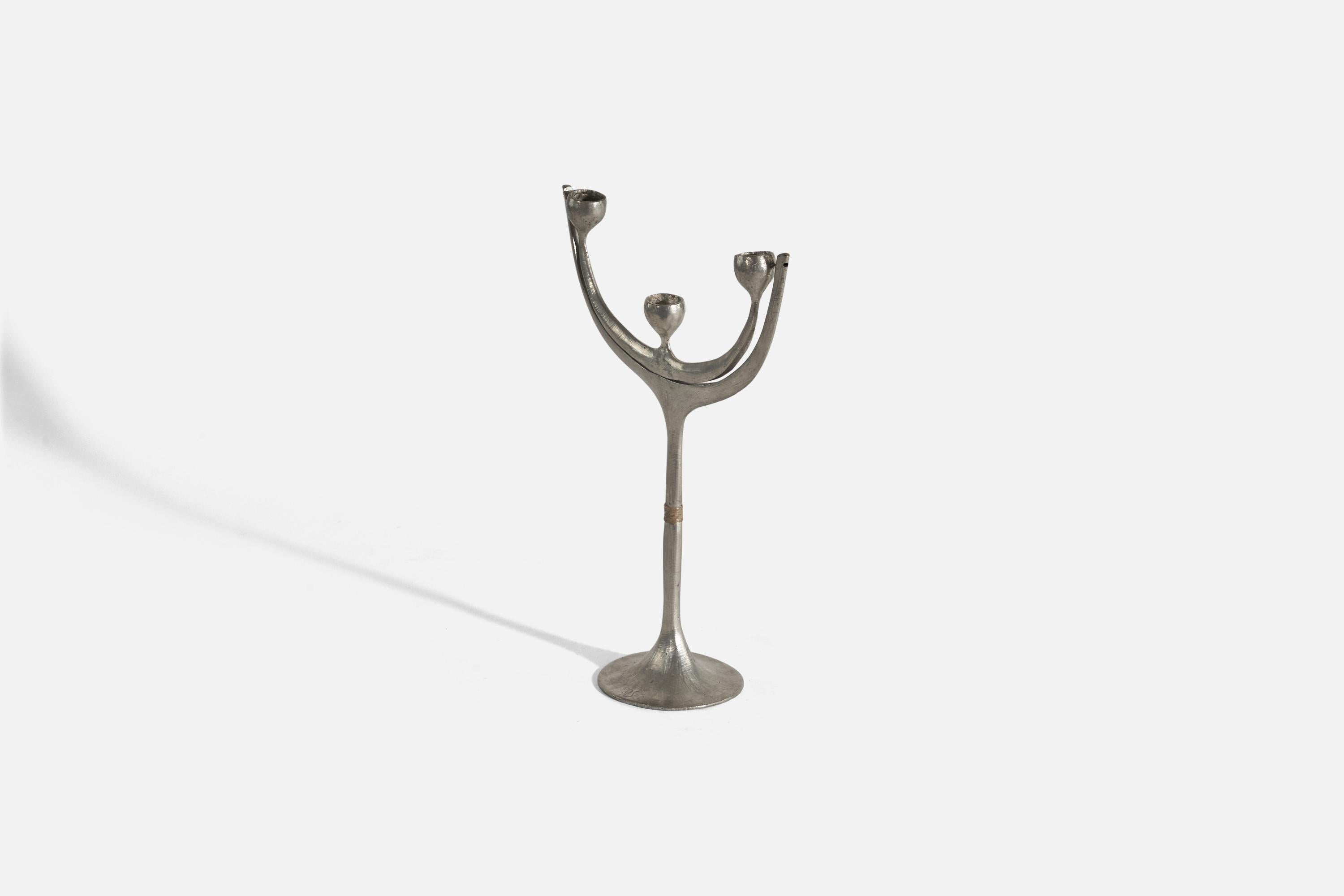 A pewter and waxed cord candelabra designed and produced by Rolf Swedberg, Sweden, 1970s. 

