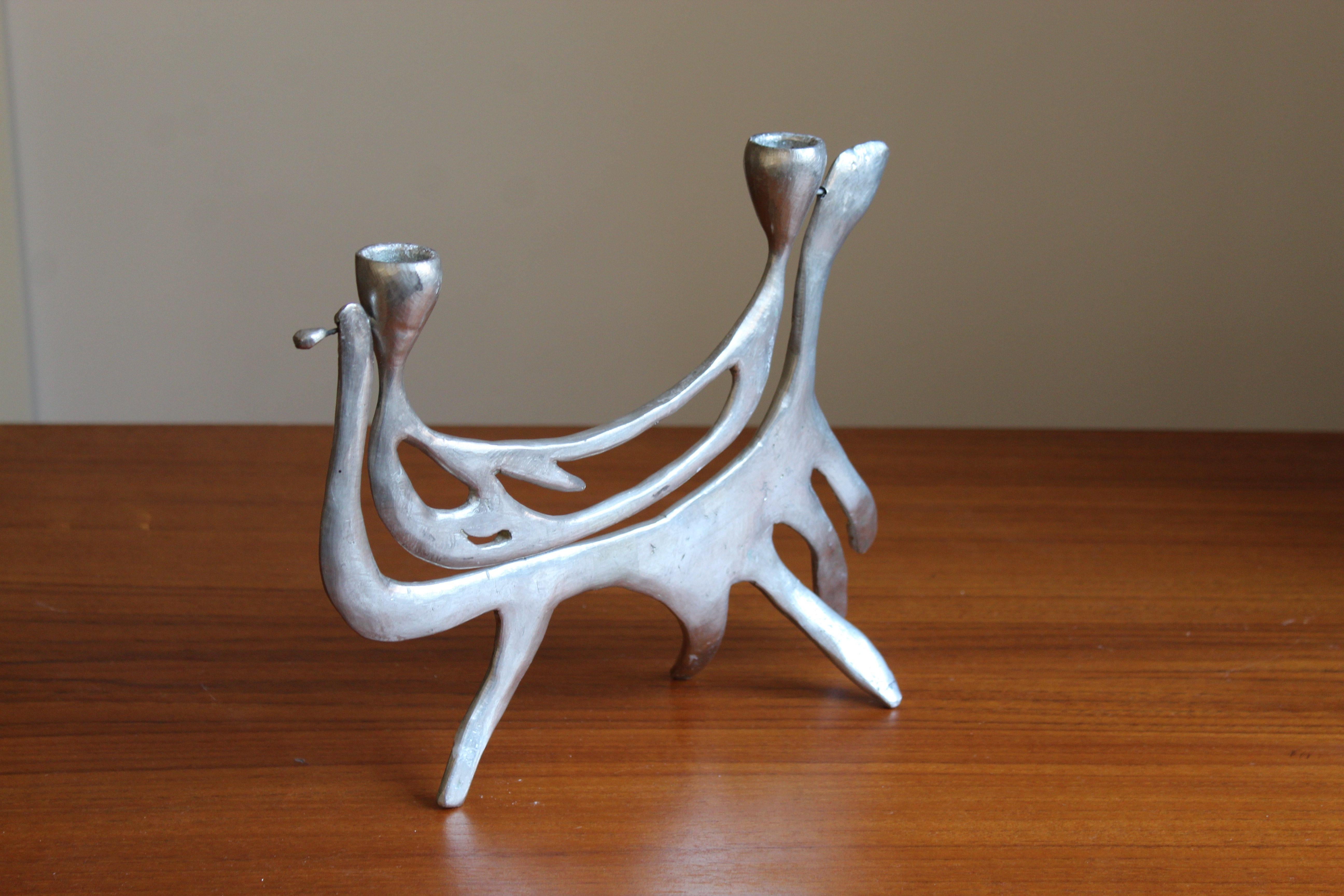 A candle holder / candelabra produced by Rolf Swedberg, Studio, Sweden, 1970. Signed

Other designers of the period include Josef Frank, Paavo Tynell, Serge Mouille, and Hans Bergström, and Isamu Noguchi.

 
