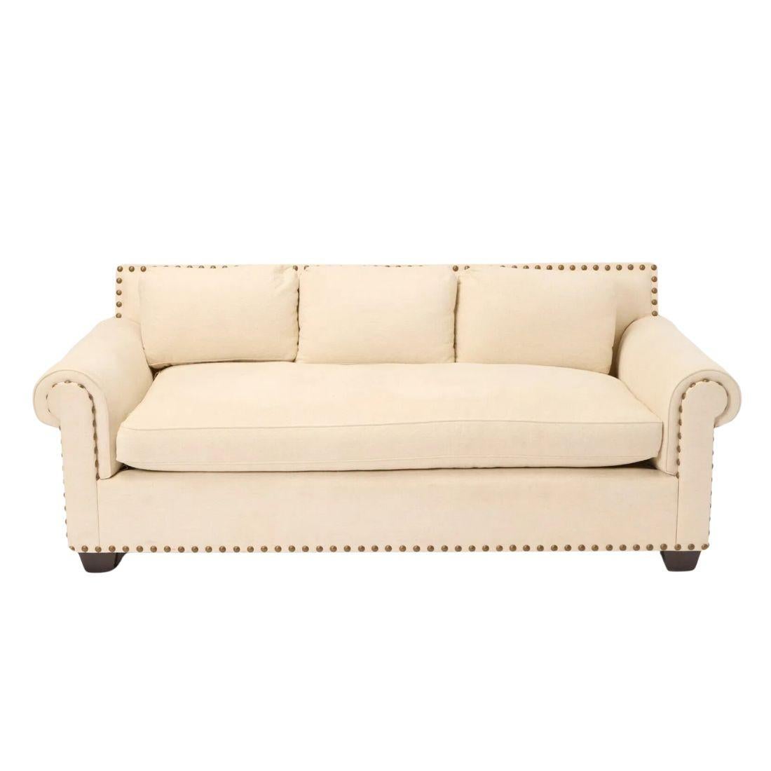 Roll Arm Cream Sofa With Large Nail Head Trim In Good Condition For Sale In Locust Valley, NY