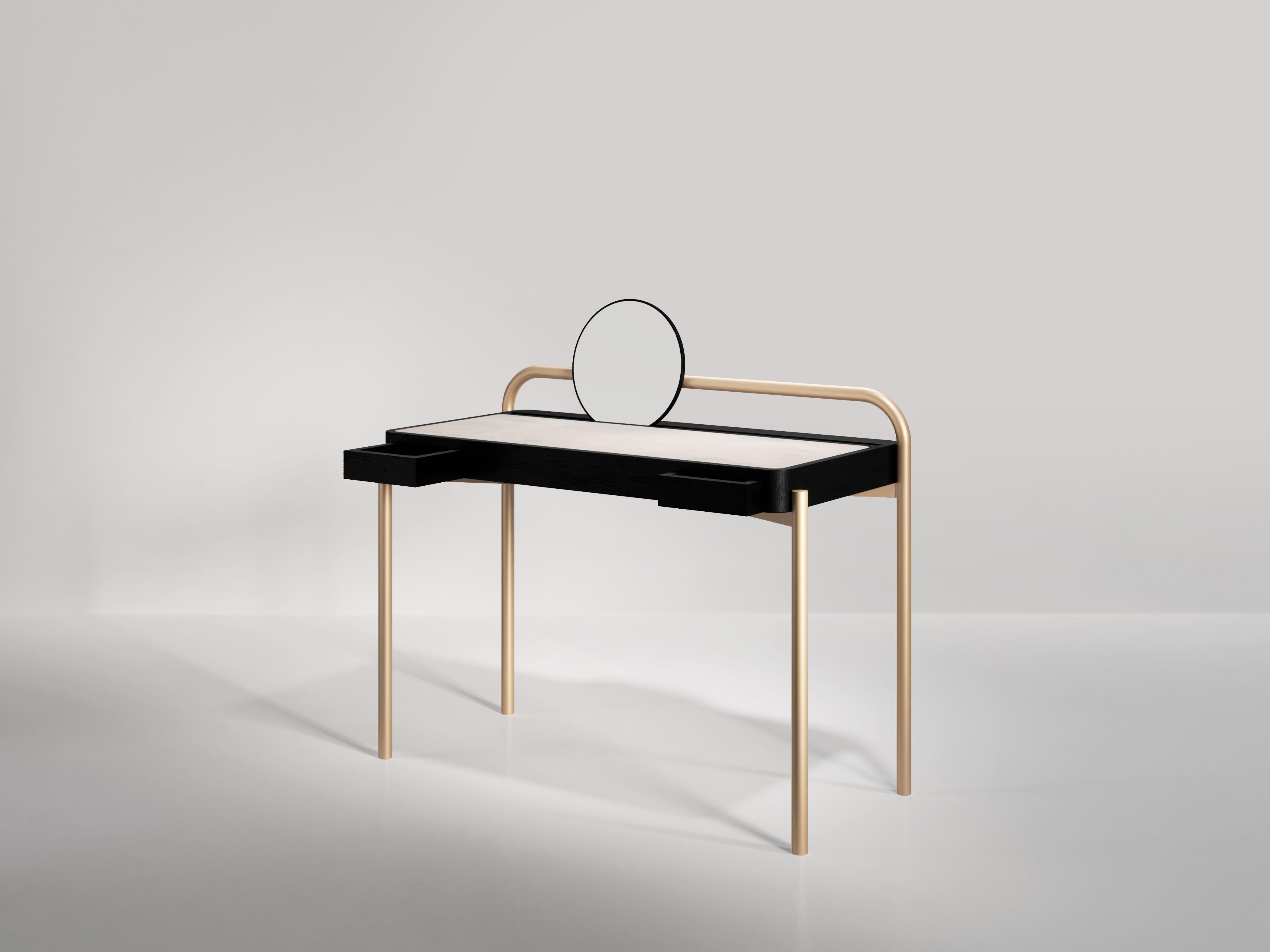 Writing desk by day and vanity table by night; roll desk 02 is a minimal piece with four metal legs supporting a solid wooden top. The top is upholstered in suede or leather for easy and comfortable use. The back legs are sculpted from one