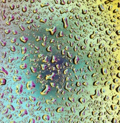 Laura (Woman's head  as  seen thru water droplets which in turn are body parts)