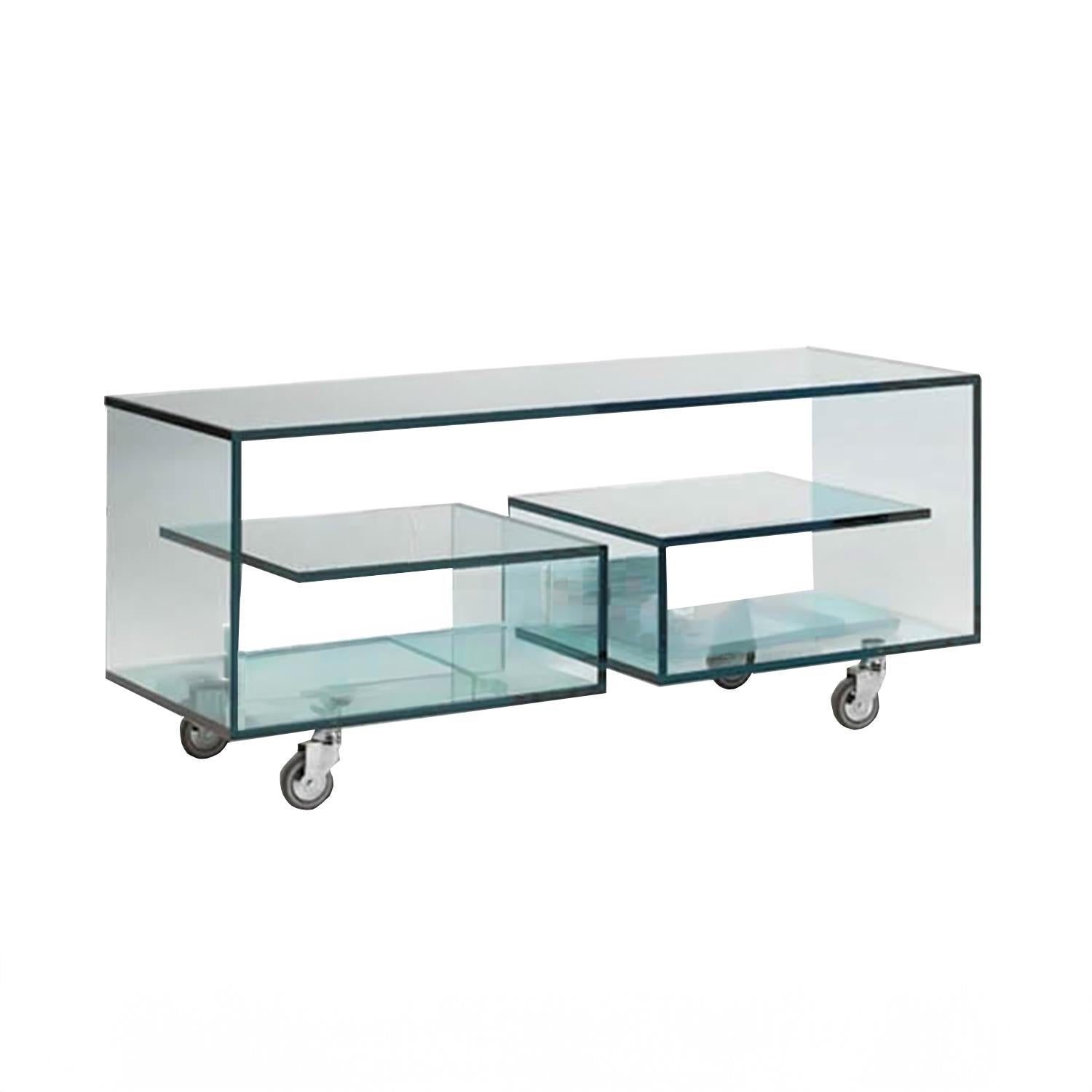 TV Table Rollin with all structure in transparent 
glass with 5 tops on a rolling base with 4 casters.