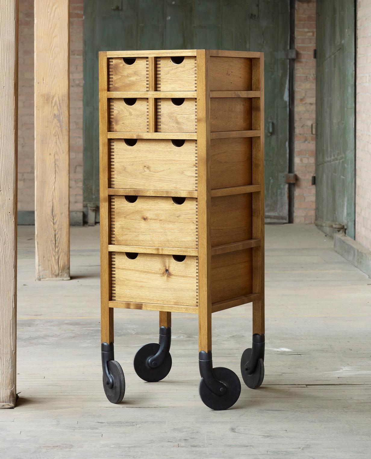 Built entirely of solid wood, the Shaker-influenced Rolling Dresser features open-frame construction and hand-carved, swiveling solid wood casters. Made to order at our Chicago studio and available in a range of species and finishes. 

Founded in