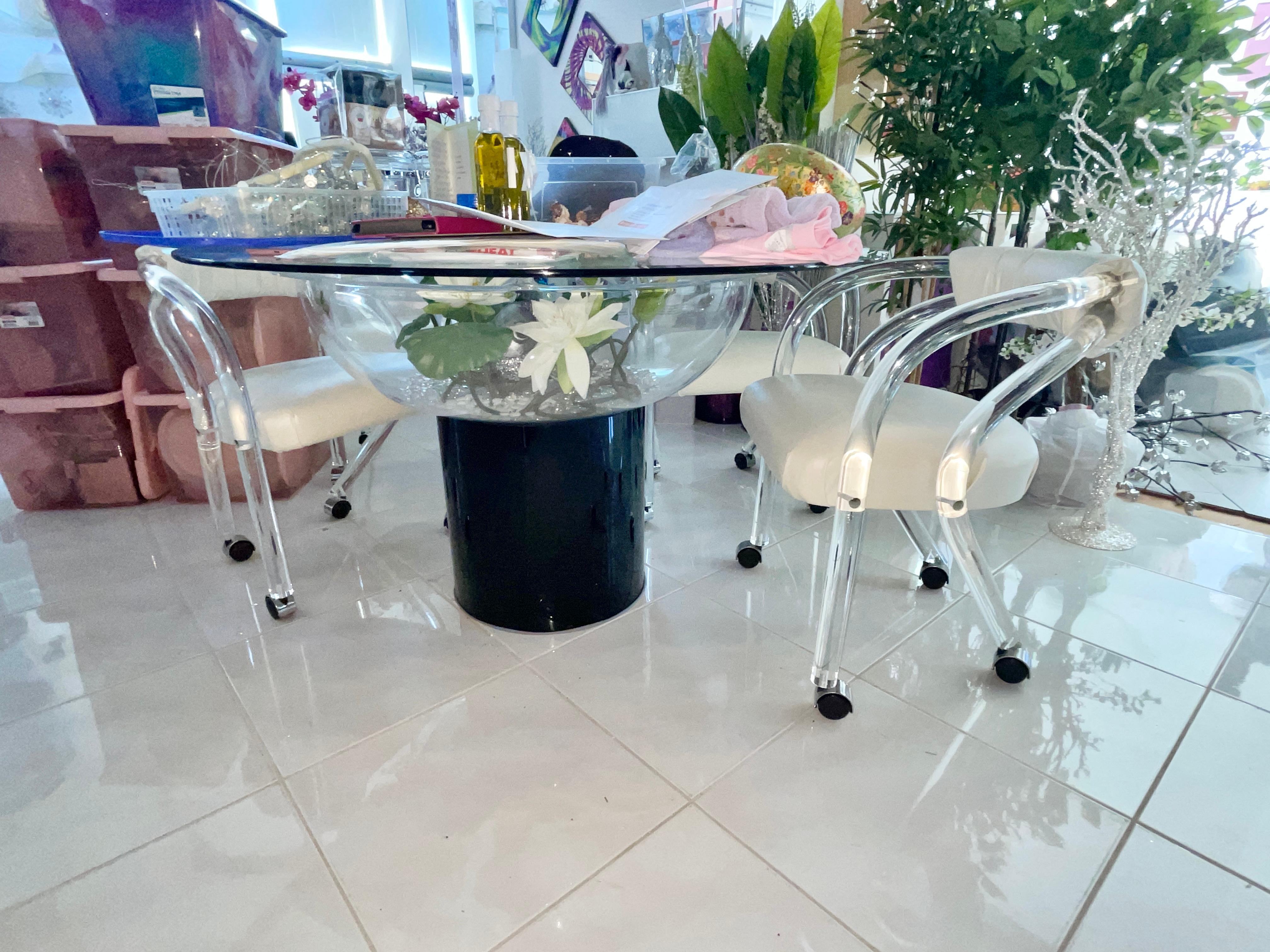 Rolling Lucite Chairs Set of Four 4