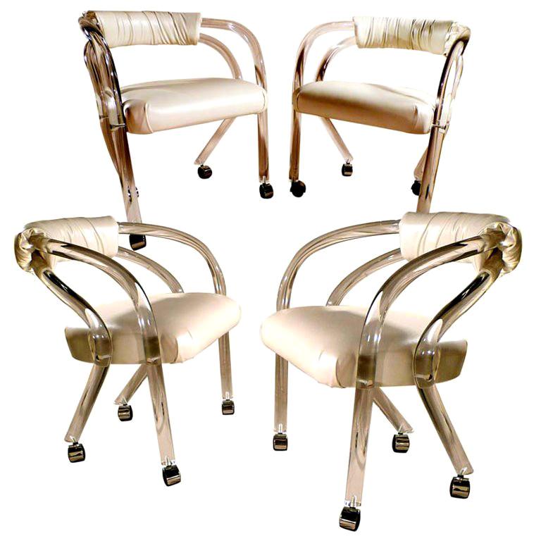 Rolling Lucite Chairs Set of Four For Sale