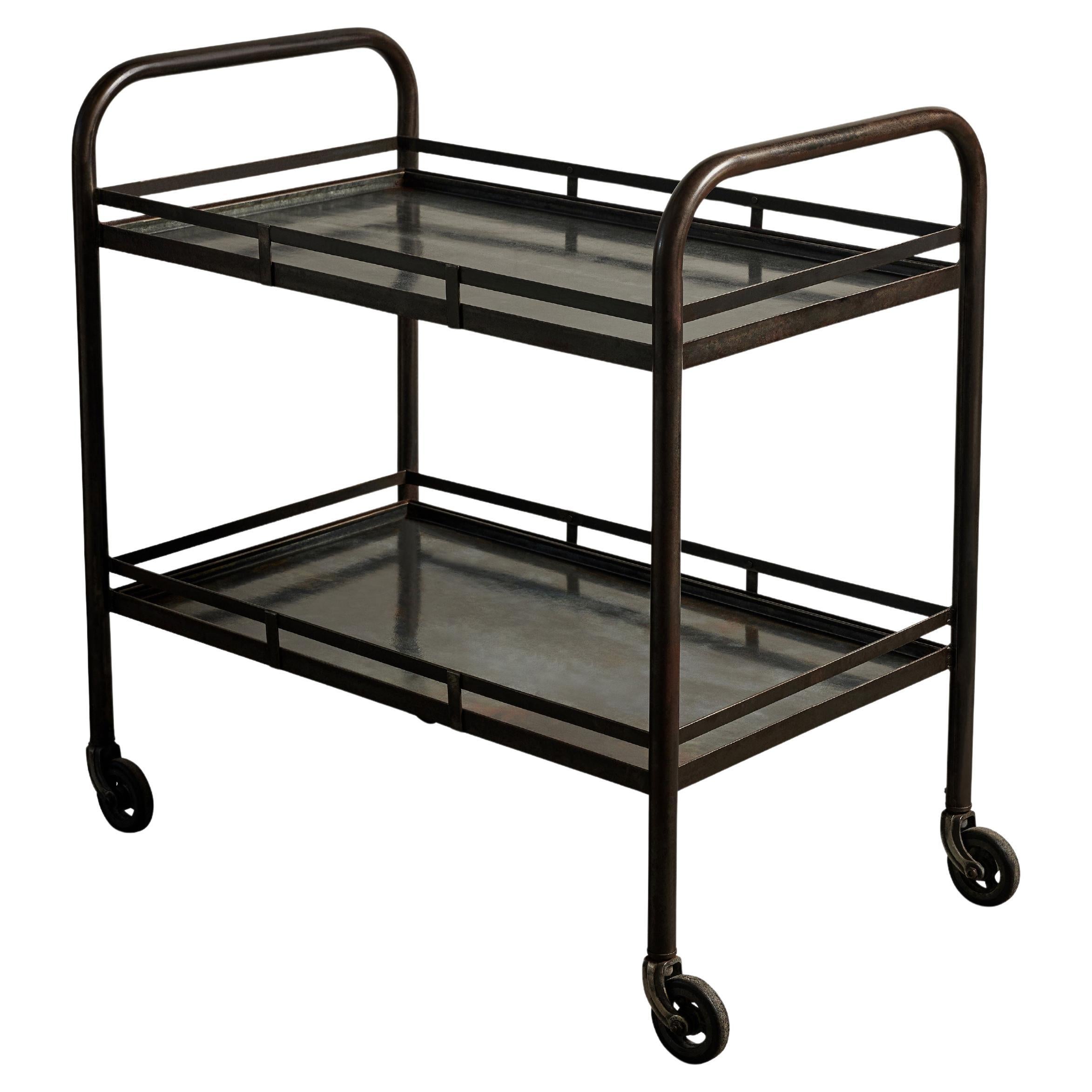 Rolling Patinated Steel Industrial Cart on Casters, Jacques Adnet, 20th C in vendita