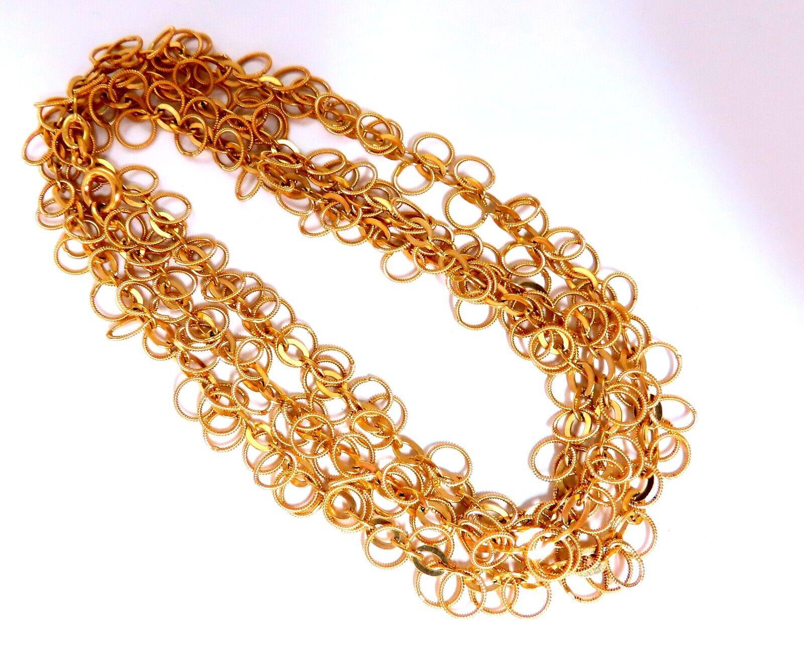 Rolling Rings Link Necklace 

 14kt Yellow Gold

Weight: 39 Grams

28 inches length.