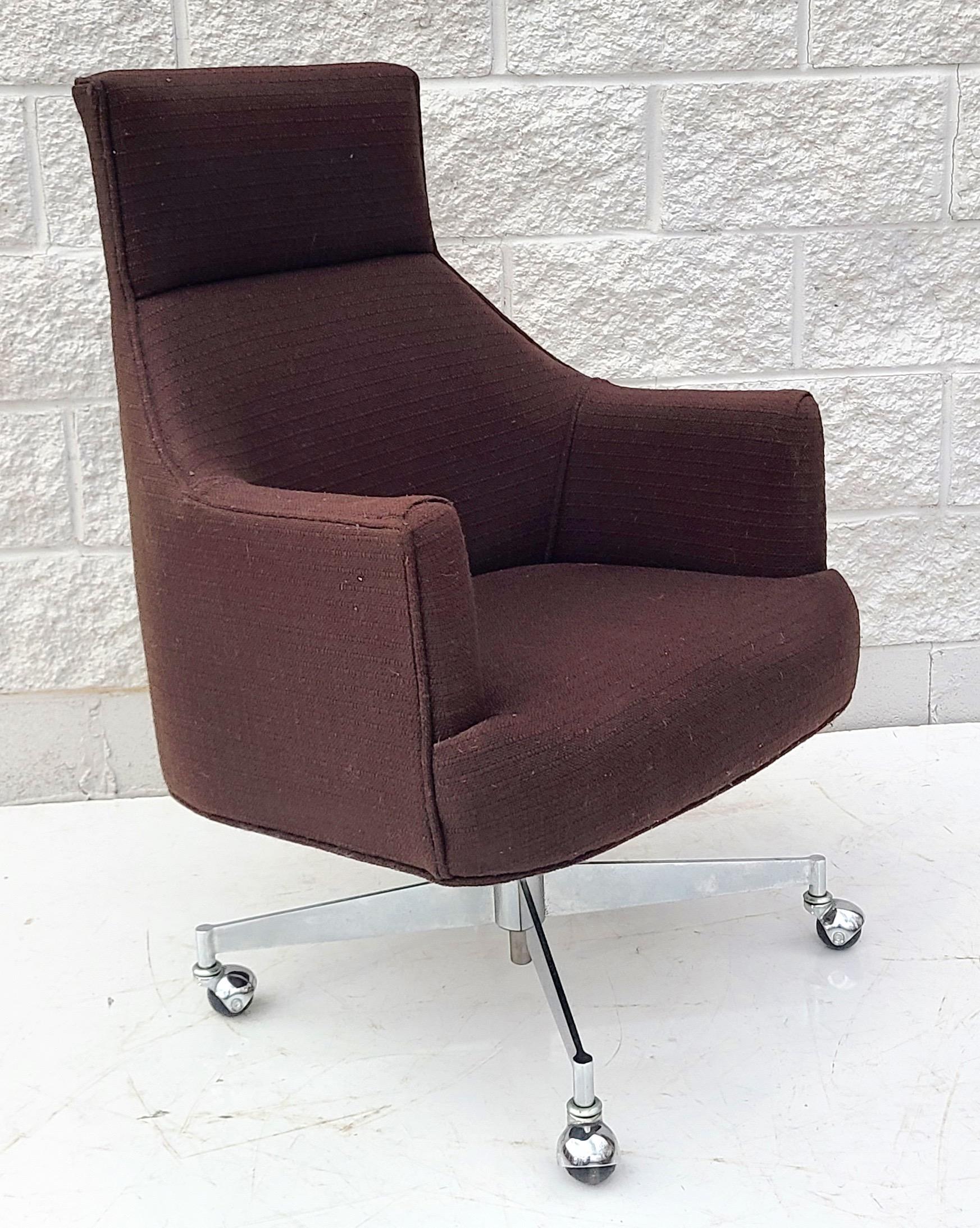 Please reach out for efficient shipping to your location.

Rolling executive chair by Dunbar Furniture Company