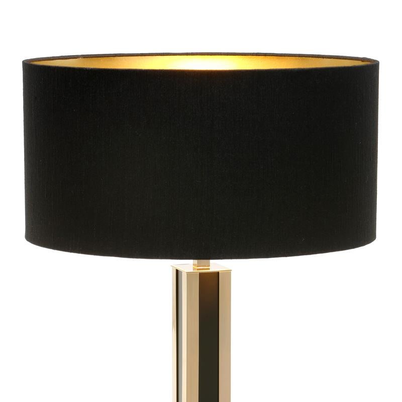 Table lamp rollins in solid polished brass.
With gold brass and black brass finish.
With black lamp shade included. With 1 bulb,
lamp holder type E27, 40 watt max. Bulb not
included.