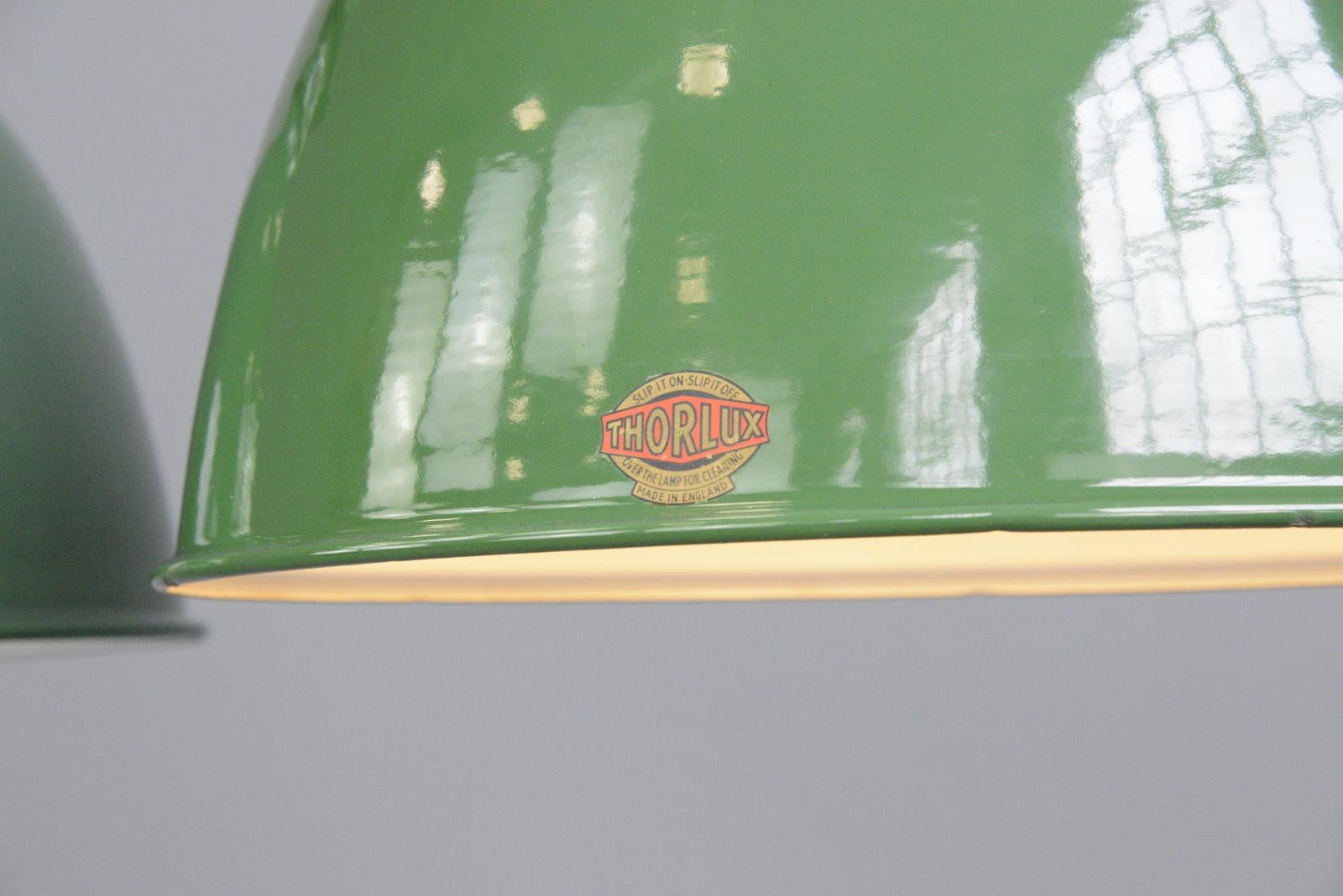 Rolls Royce factory pendant lights by Thorlux, circa 1950s

- Price is per light
- Vitreous green enamel shades
- White enamel inner reflectors
- Twist off tops
- Takes E27 fitting bulbs
- Comes with 100cm of red twist cable
- Comes with