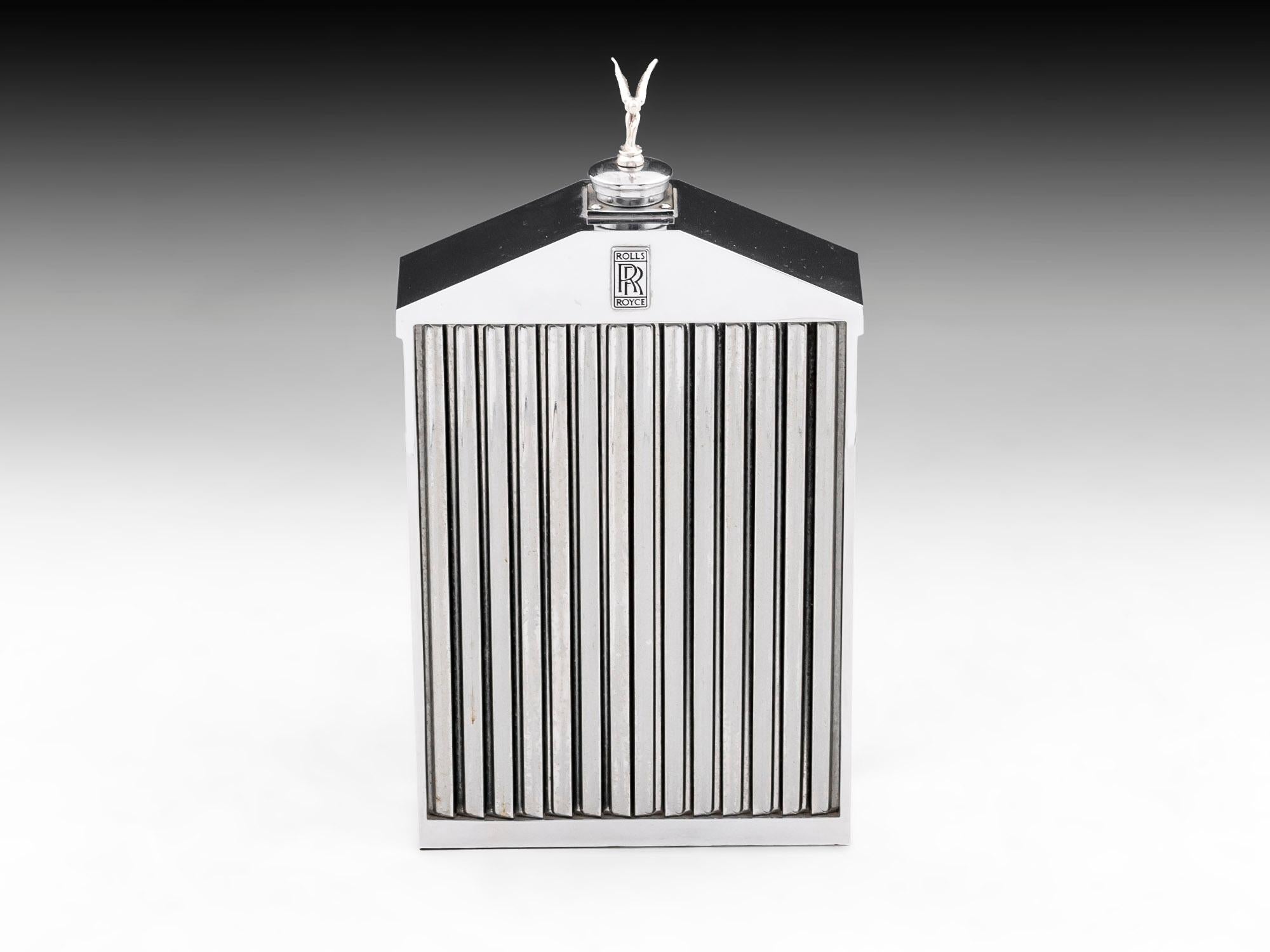 The Rolls Royce Decanter has a heavy chromium-plated finish a sure sign of high quality and surrounds a glass flask. There is a slot in the casing at the rear allowing visibility of the Rolls Royce contents with Baize cloth to the base to protect