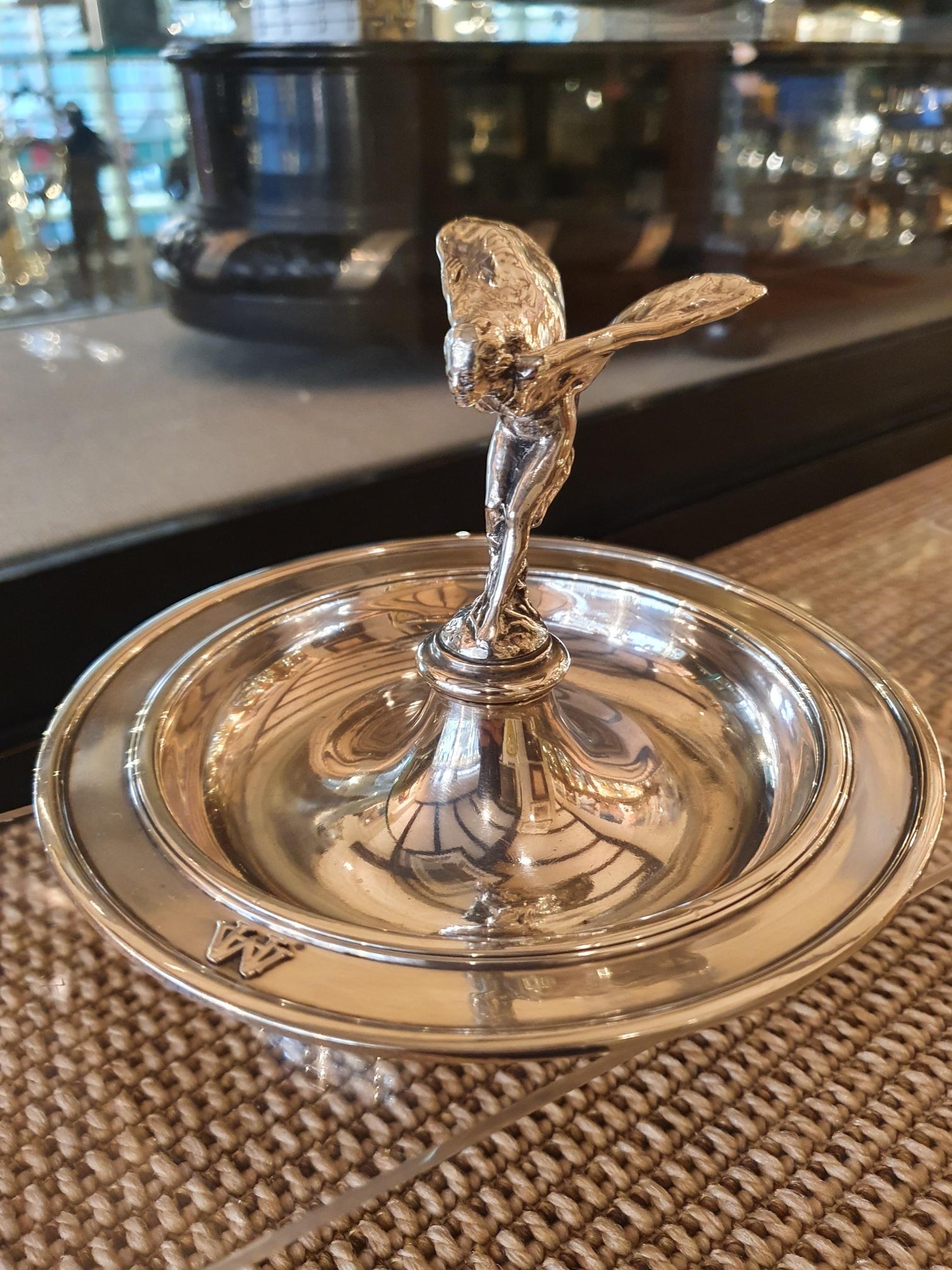 The Spirit of Ecstasy mascot has adorned Rolls-Royce automobiles for over 90 years and is one of the world’s most readily identified images. In 1926, the Directors of Rolls-Royce Motors decided to commission a gift, to be produced in a small