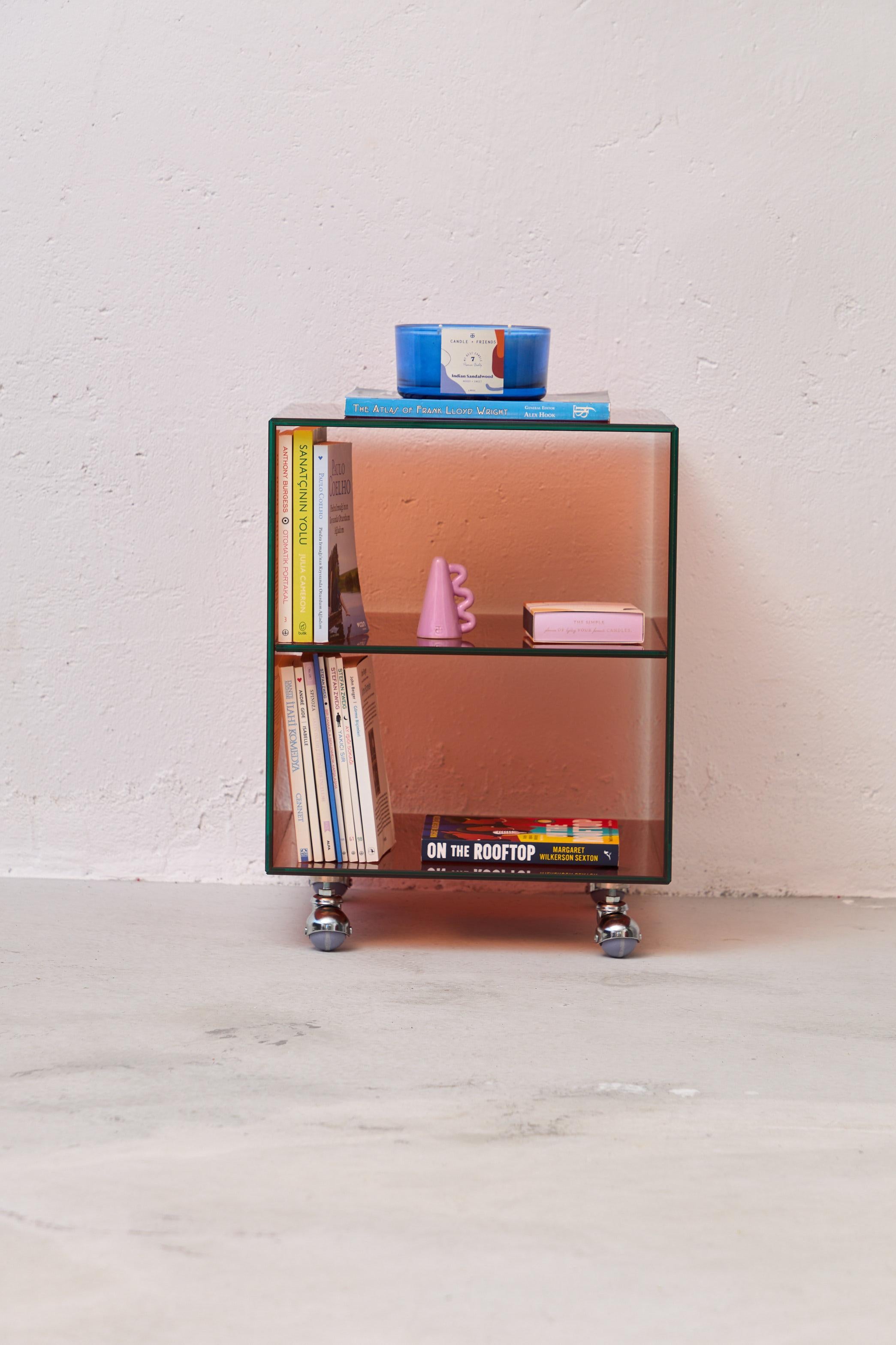 Roly Mini Orange Trolley by Studio Monsoleil
Dimensions: D 40 x W 40 x H 53 cm.
Materials: Laminated glass.

Roly trolley is an Art Deco-inspired piece that brings a touch of 1920s opulence to any modern space, for those who appreciate classic style