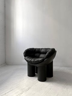 Roly Poly Armchair in Black by Faye Toogood with Aniline Leather cushions