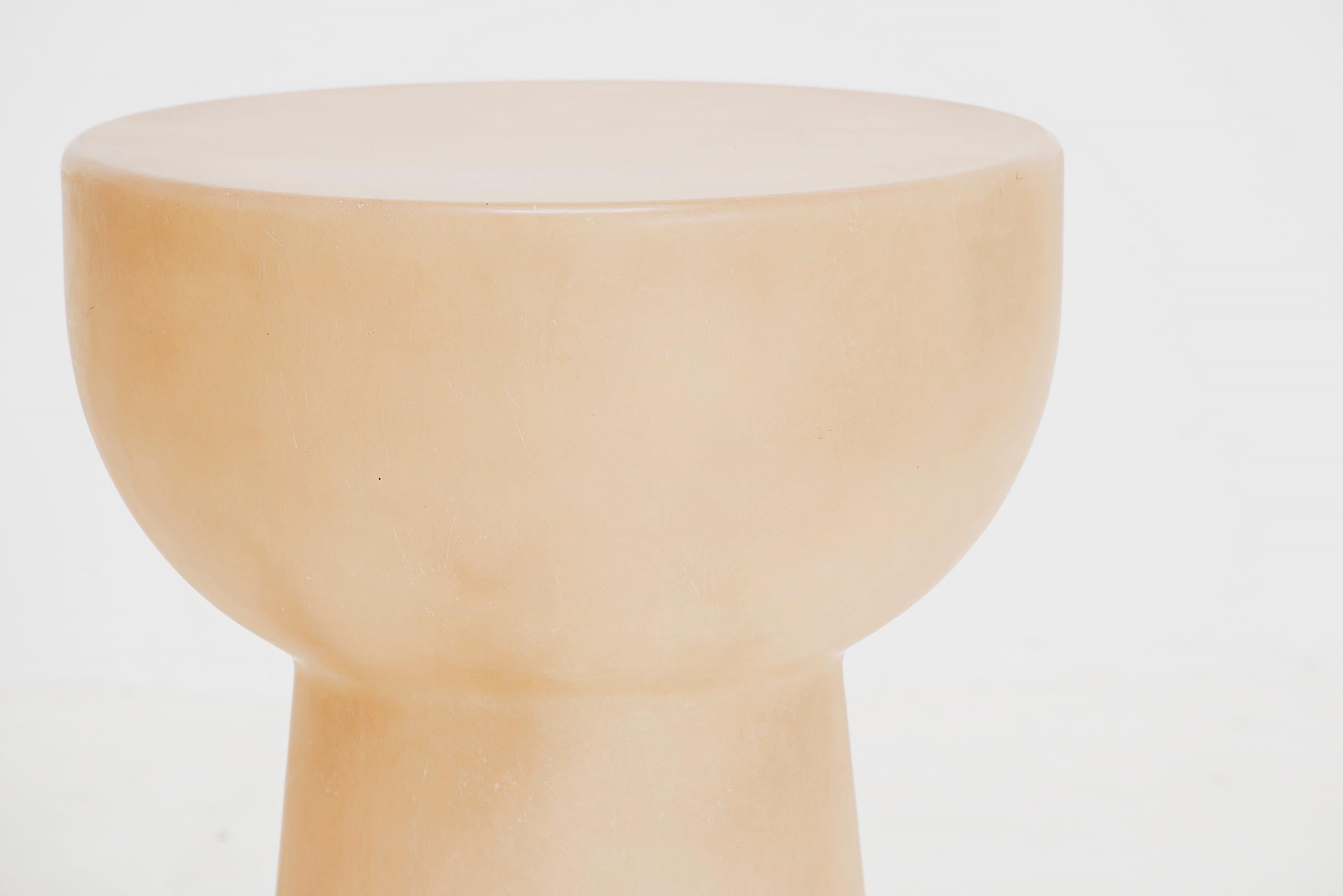 The Roly poly raw stool is made from a material that suggests a certain rawness. It embraces a world of soft lines and childlike rounded edges, an aesthetic that stands in direct contrast to the aggressive, post-industrial feel of her previous