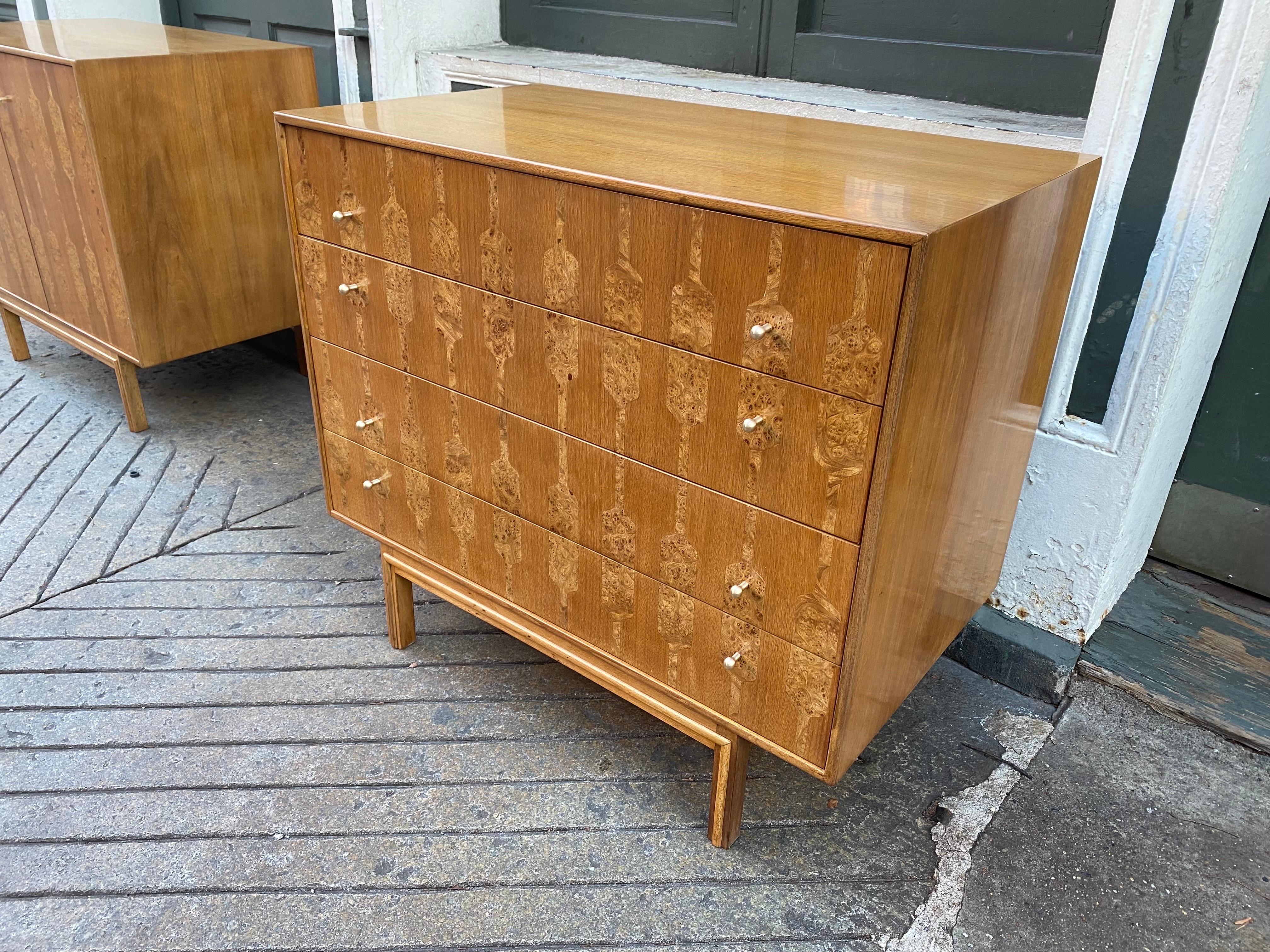 Romweber 4 drawer Dresser. Newly refinished and ready to go! Beautiful inlay olive ash burl. 4 drawers with 2 brass knobs per drawer. Second 2 door cabinet available as well!.