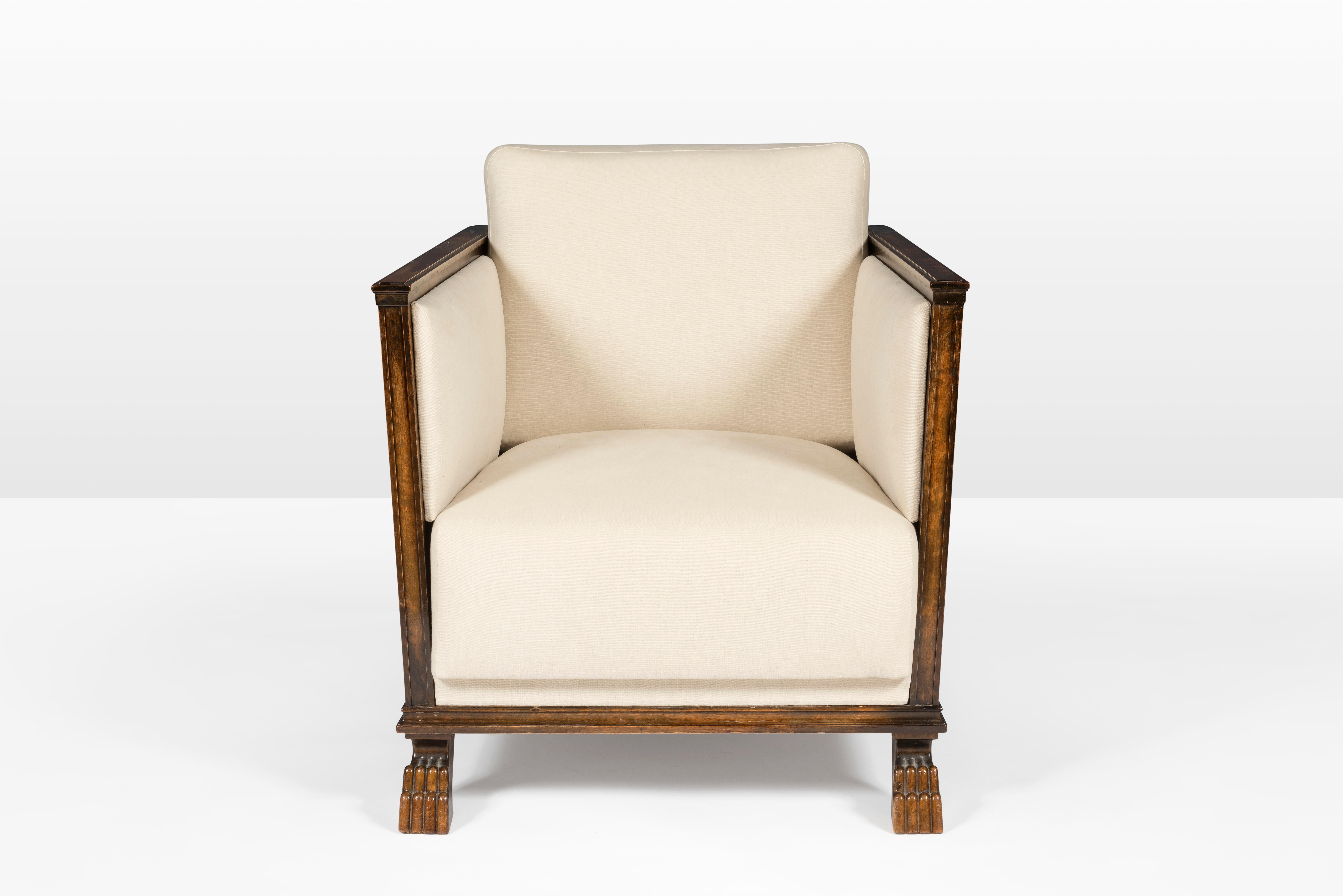 Swedish Art Deco club chair made by Axel Einar Hjorth circa 1920s-1930s for Bodafors of Sweden. Constructed from Flamed birch in Hjorth's iconic design style of strong lines and geometric patterns. It has a unique paint in honey gold and brown hues.