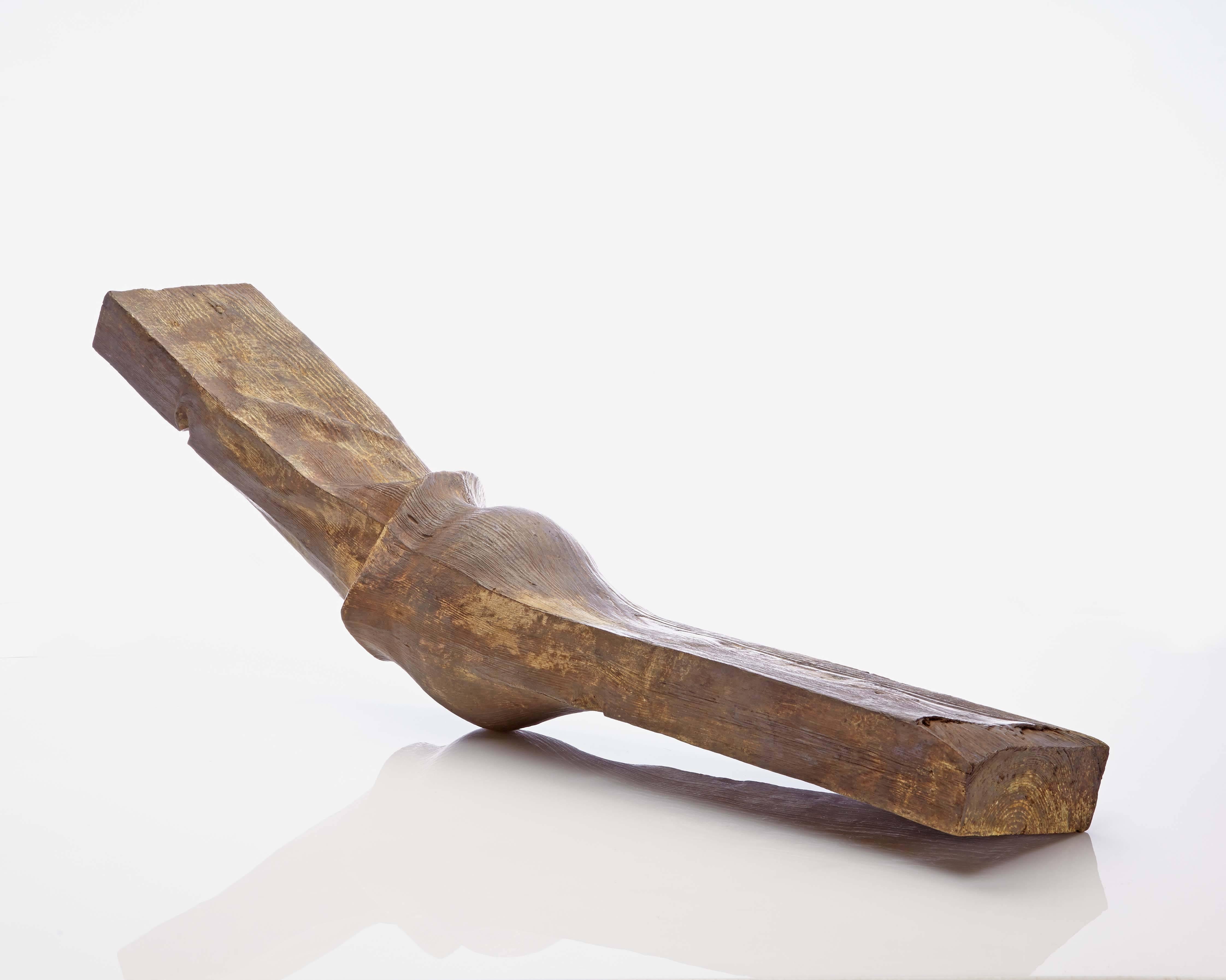 Poutre (Beam) is a bronze sculpture by French contemporary artist Romain Langlois. In this kind of "trompe l'oeil" work, the artist takes a very mundane object (a beam, the kind of which can be found on construction sites) and transforms it into