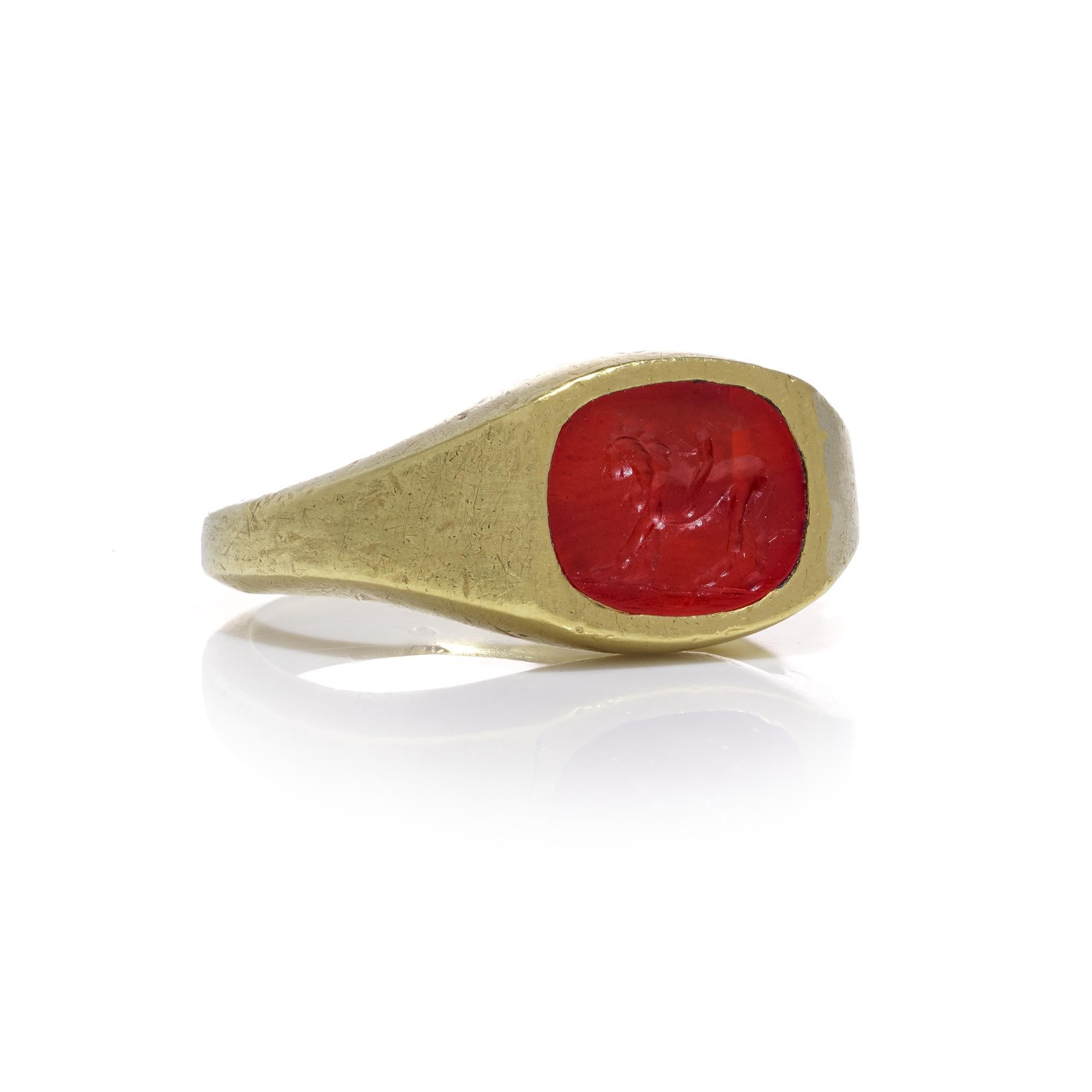 Roman carnelian intaglio with Cupid riding a Lion mounted in 22kt gold In Good Condition For Sale In Braintree, GB