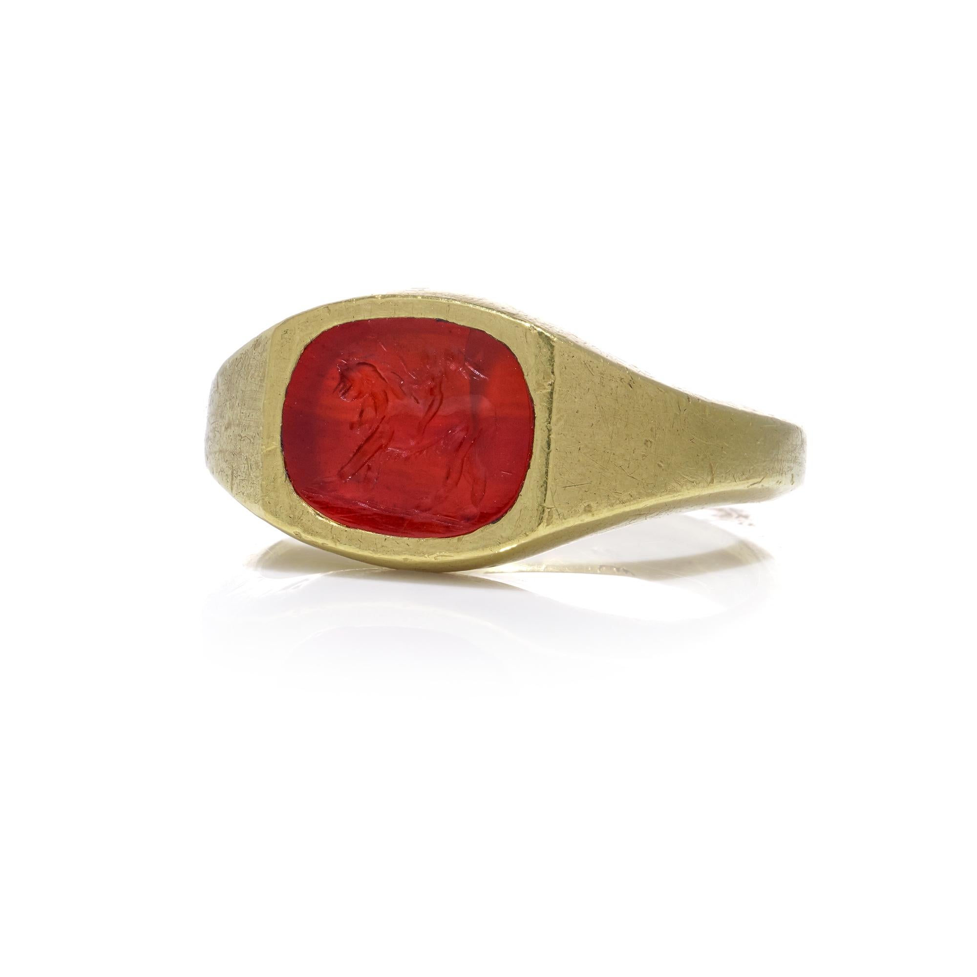 Roman carnelian intaglio with Cupid riding a Lion mounted in 22kt gold For Sale 1