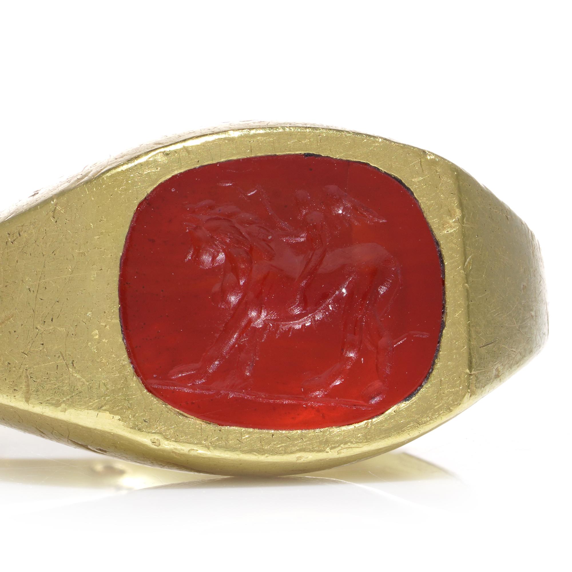 Roman carnelian intaglio with Cupid riding a Lion mounted in 22kt gold For Sale 2