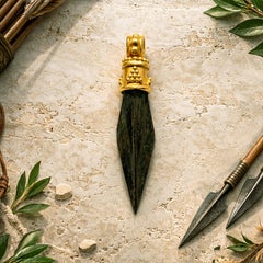 Roman arrowhead 2-6th century BC mounted in 18 kt gold, olive-green patina