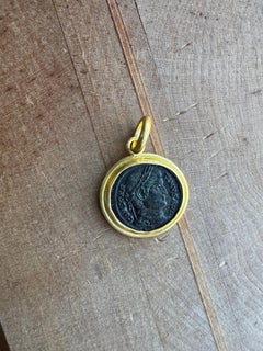 Römische Bronzemünze, Anhänger aus 22 Karat Gold