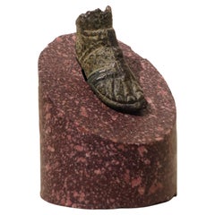 Roman bronze sandaled foot on Egyptian imperial red porphyry base