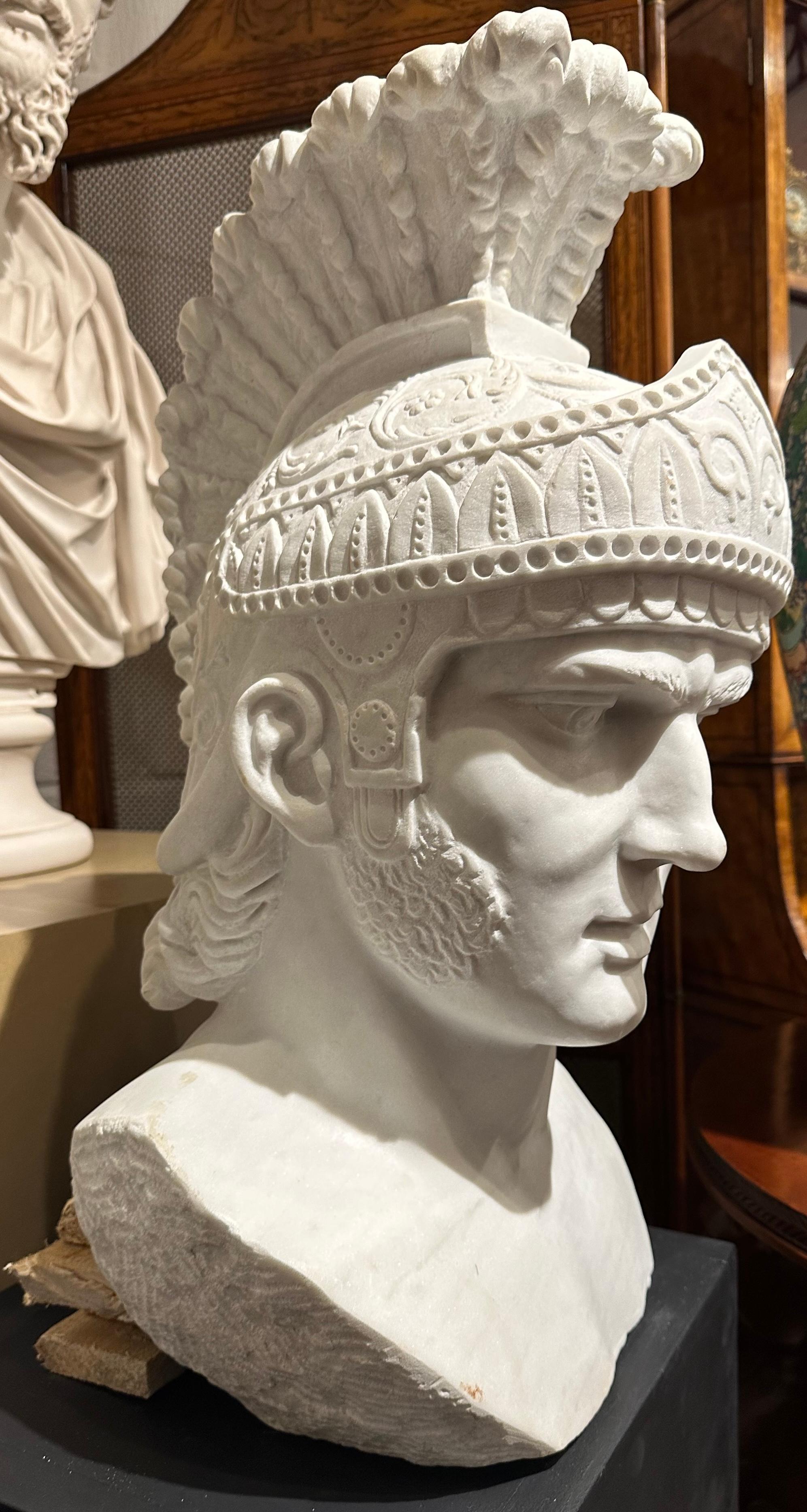 Exquisitely detailed carving of a Roman Bust with Helmet. The Males features are intricately carved with attention given to the shape of the nose and furrowed brow as he prepares to go into battle. The helmet is extremely elaborate with a folate