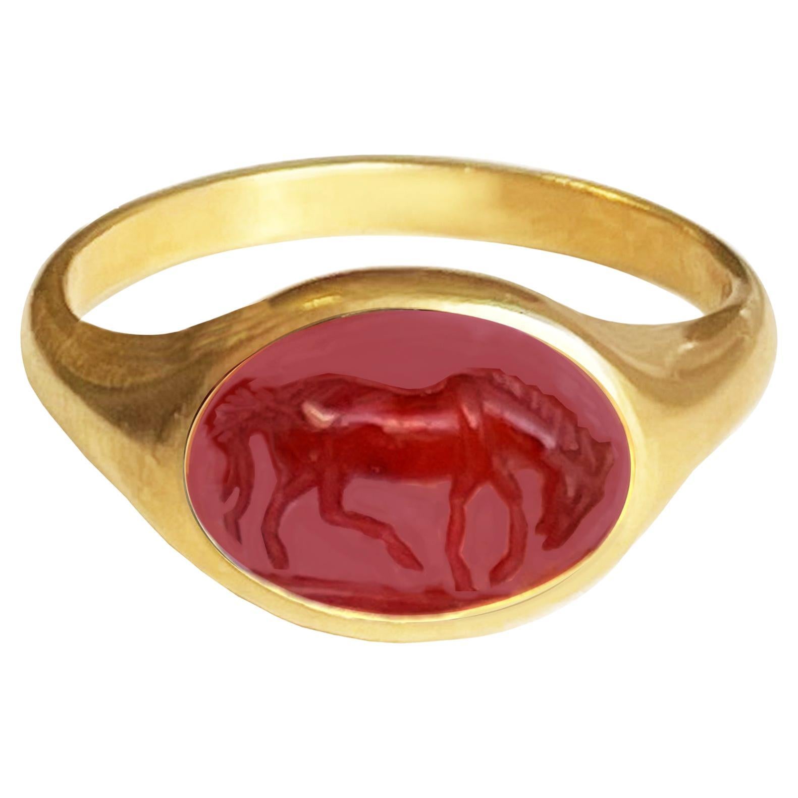 Roman Carnelian Intaglio (2nd-3rd cent.AD)  18 Kt Gold Ring depicting a Horse