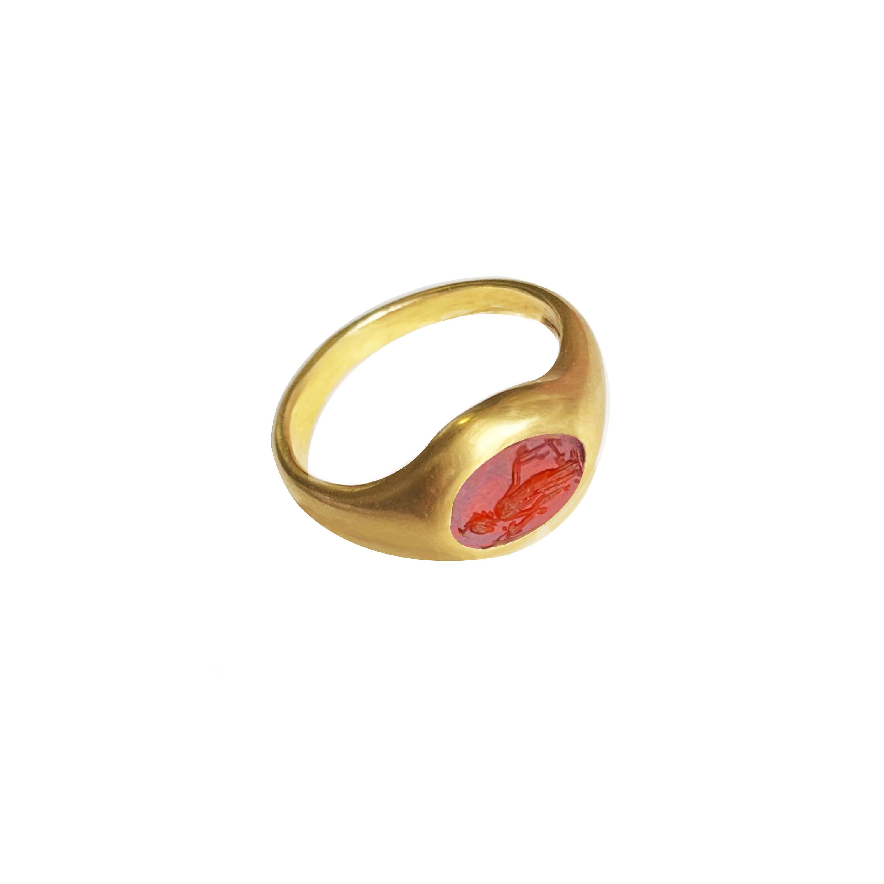 This 18 Kt gold ring, from SERRA archeological collection, use genuine ancient Roman  intaglio on carnelian, that date circa 2- cent.A.D, depicting a Tyche, that  in ancient Roman religion was the personified Goddess of Fortune .
Fortune (Latin: