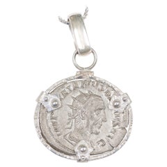 Roman Coin Pendant w/ Silver Trim
Bail Roman Coin Pendant w/ Silver Trim
Bail