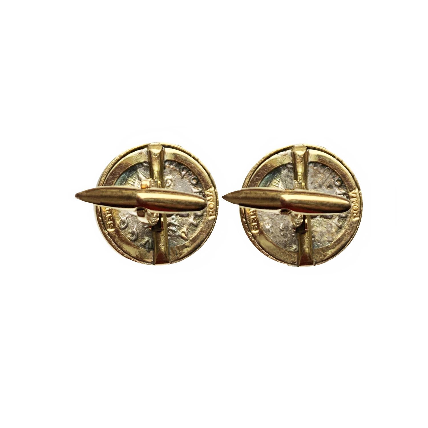 In these 18 kt gold cufflinks  authentic roman coins ( silver denarius-3th century A.D.) depicting Emperor Alexander Severus  and his wife Orbiana are set.
Alexander Severus  was Roman Emperor from 222 to 235 and the last emperor of the Severan