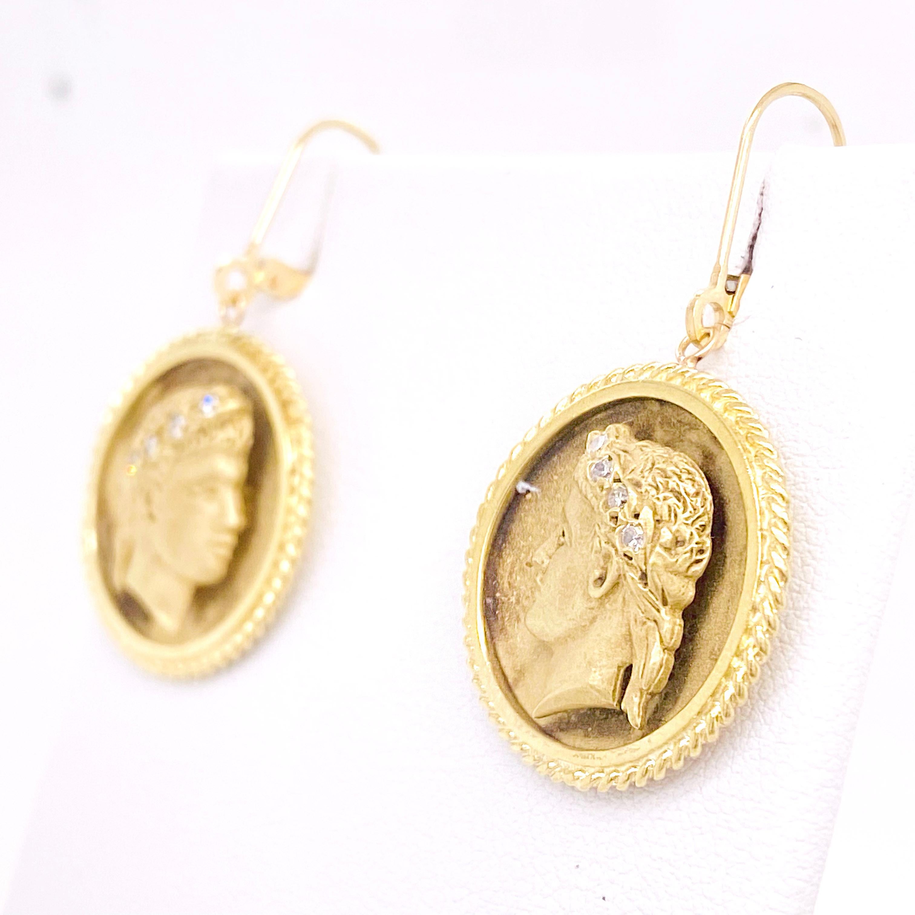 The 18 karat yellow gold Custom Roman Earrings have a side profile of a Roman God that has four diamonds in each of their hair. The earrings are mirror images of each other and the head is raised off of the 3/4 inch disk (21.6 millimeters). There is